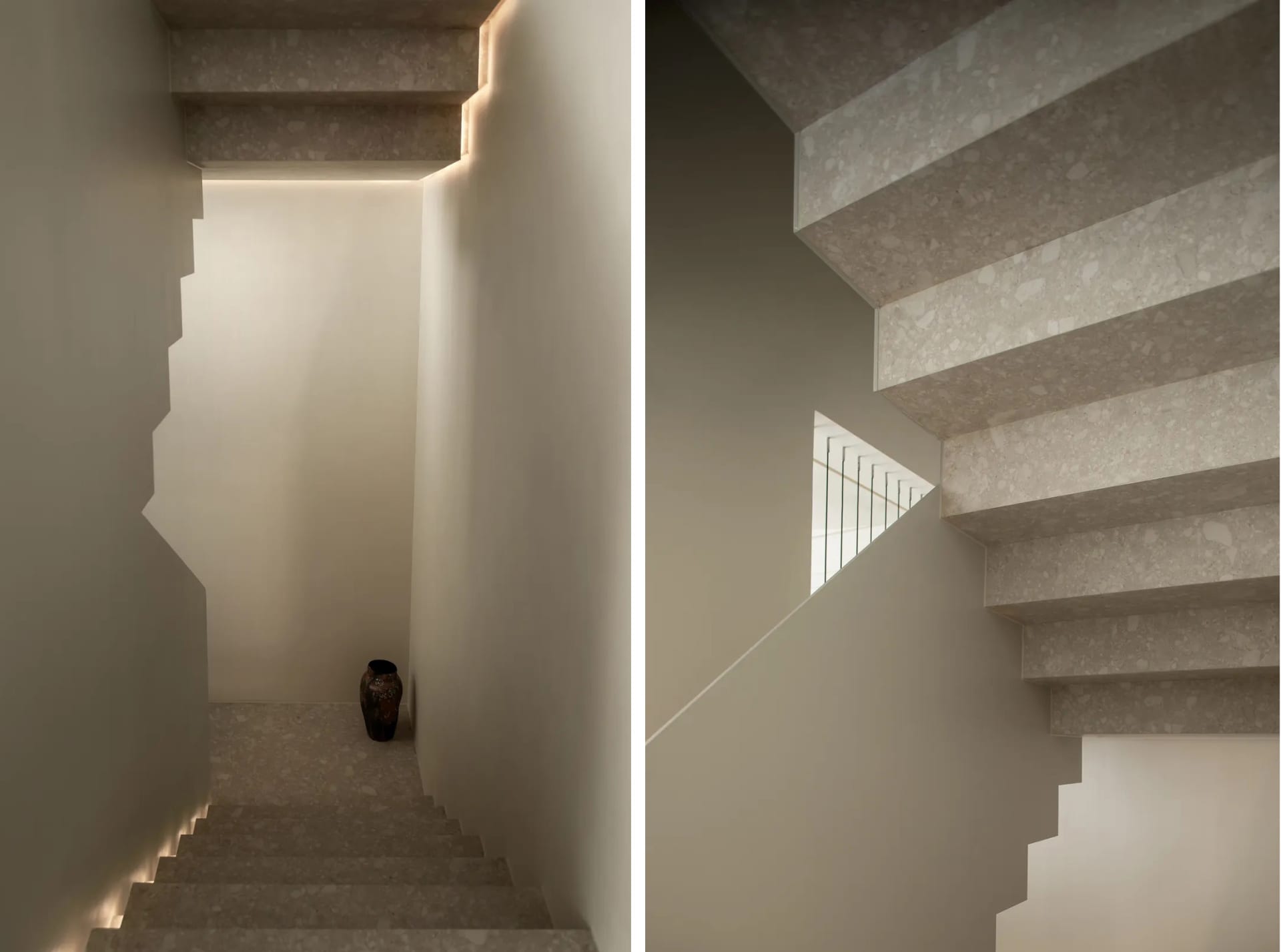 A modern staircase with white terrazzo tiles and hidden lighting features a vase at the bottom.