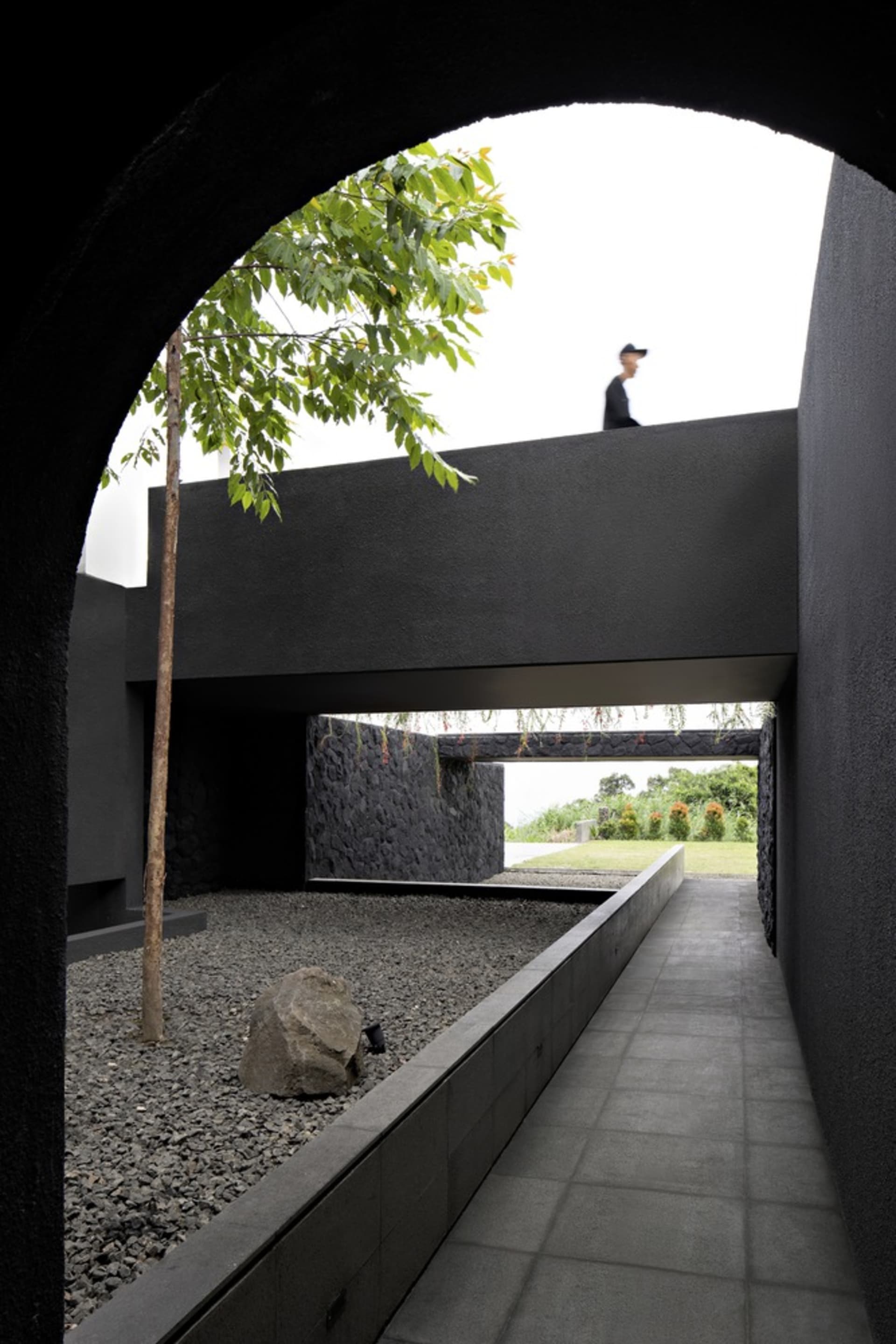 A modern architectural space featuring concrete material and a minimalist design.