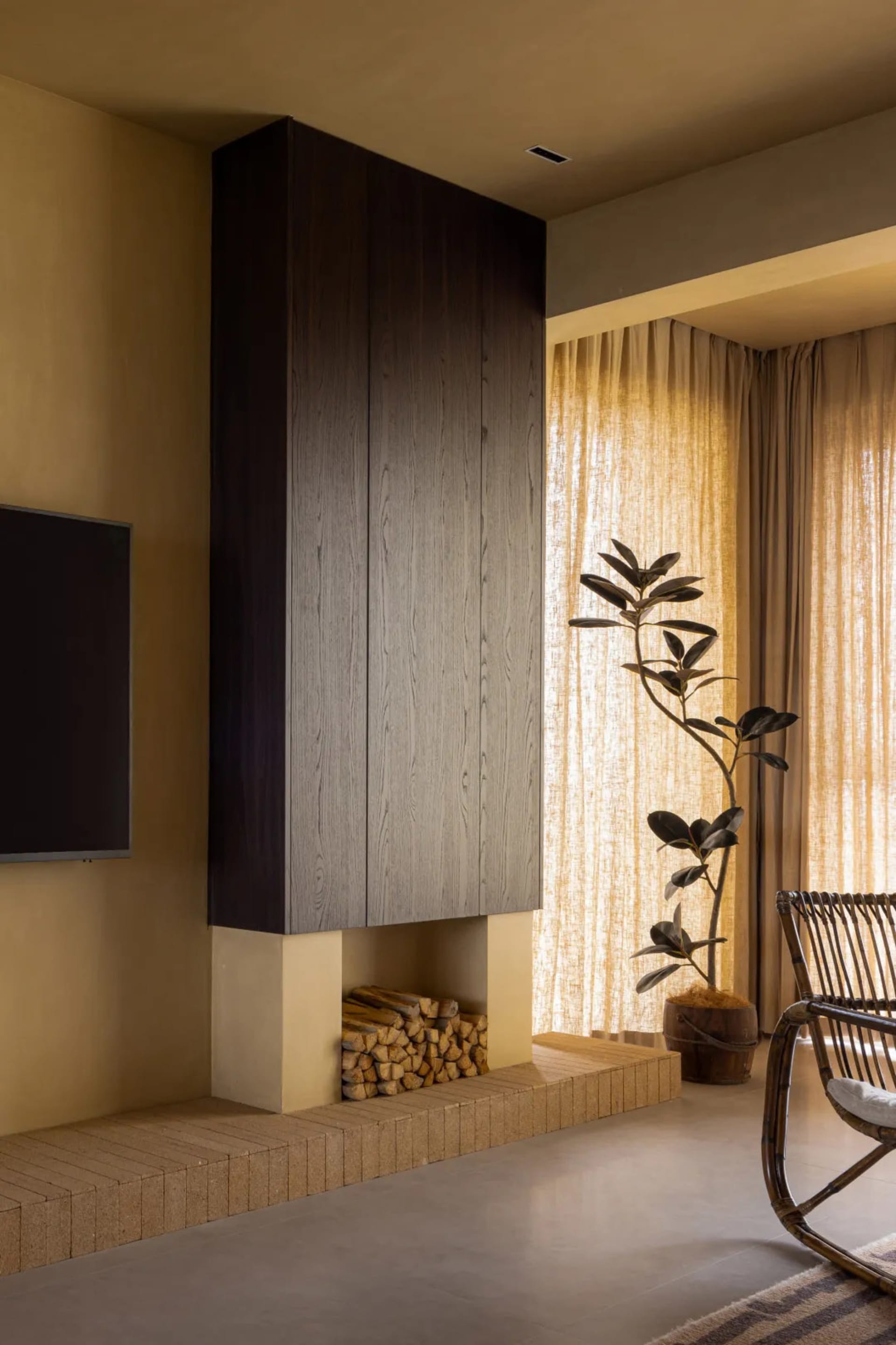 Minimalist living room featuring wooden and bamboo elements