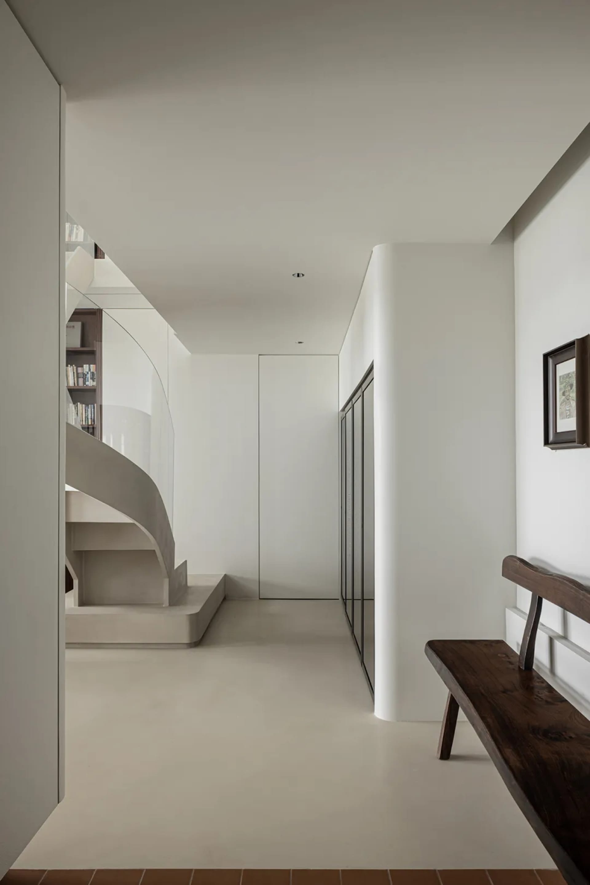 Concrete staircase and interior design elements in a modern setting