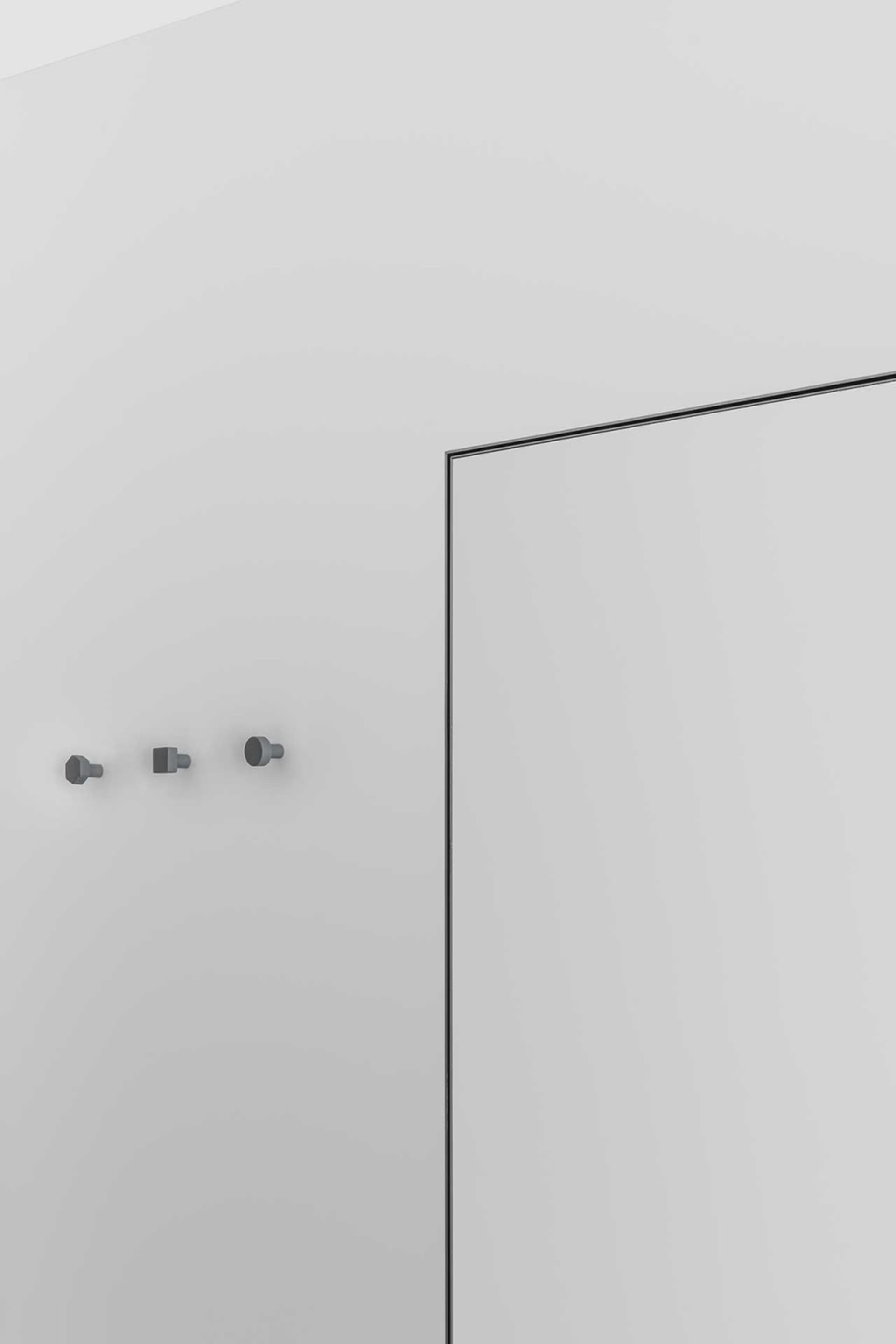 Modern, minimalist interior design featuring a glass panel wall.