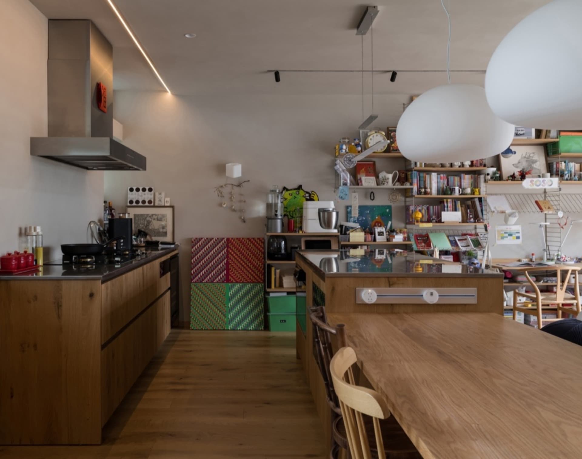 Wooden kitchen with modern design elements and functional zones.