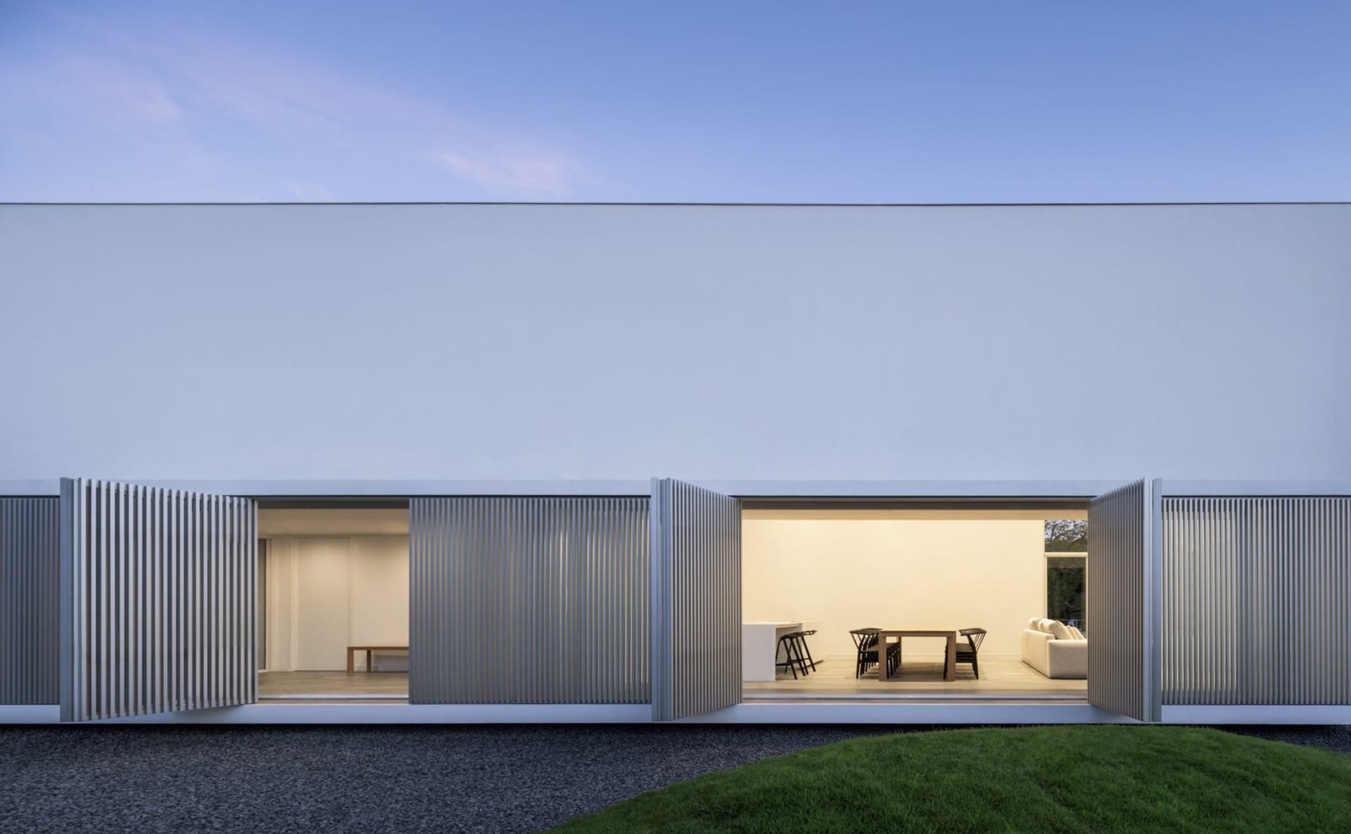 A minimalist residential interior featuring modern materials and design.
