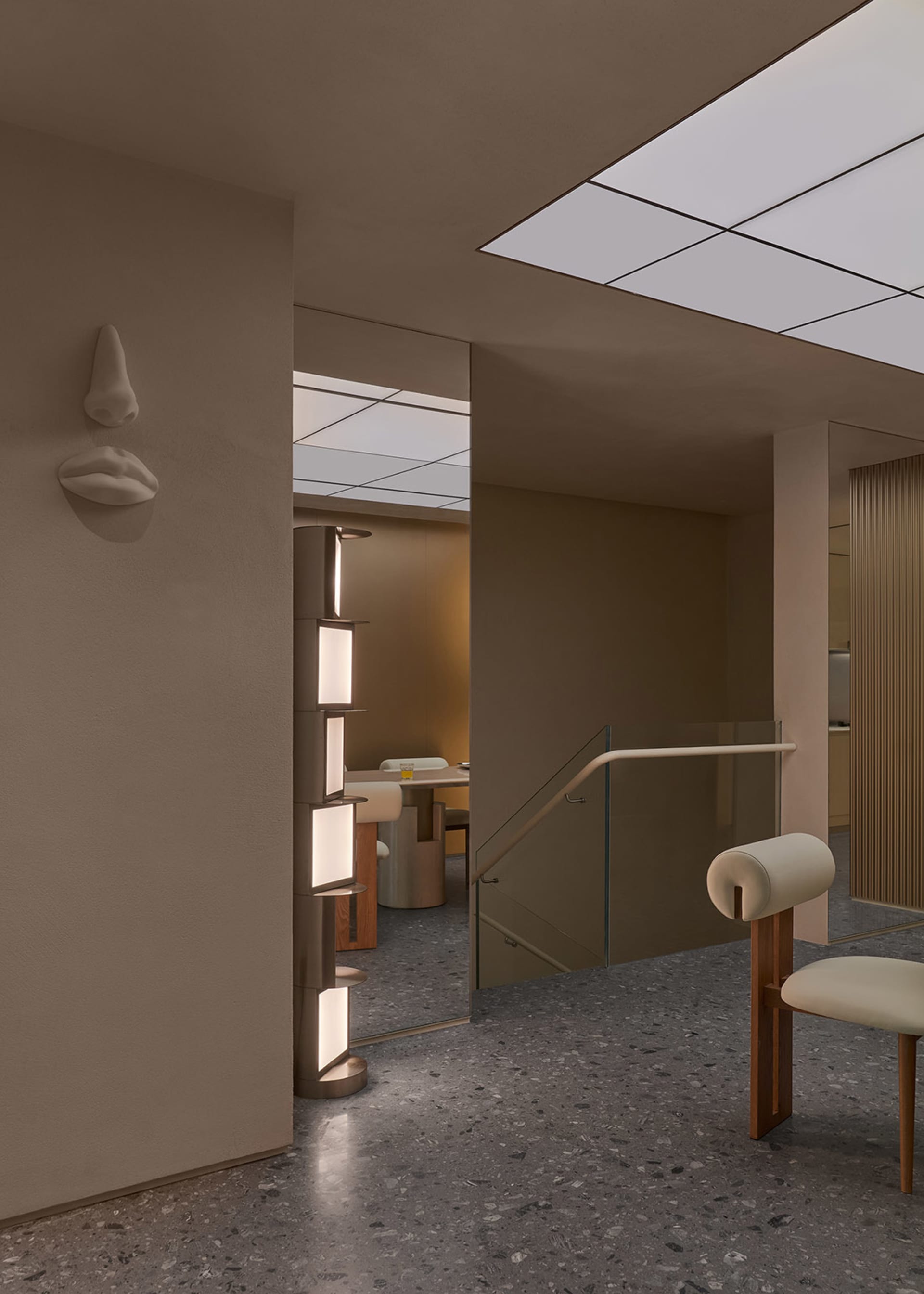 Minimalist interior design with concrete materials and sleek lines.