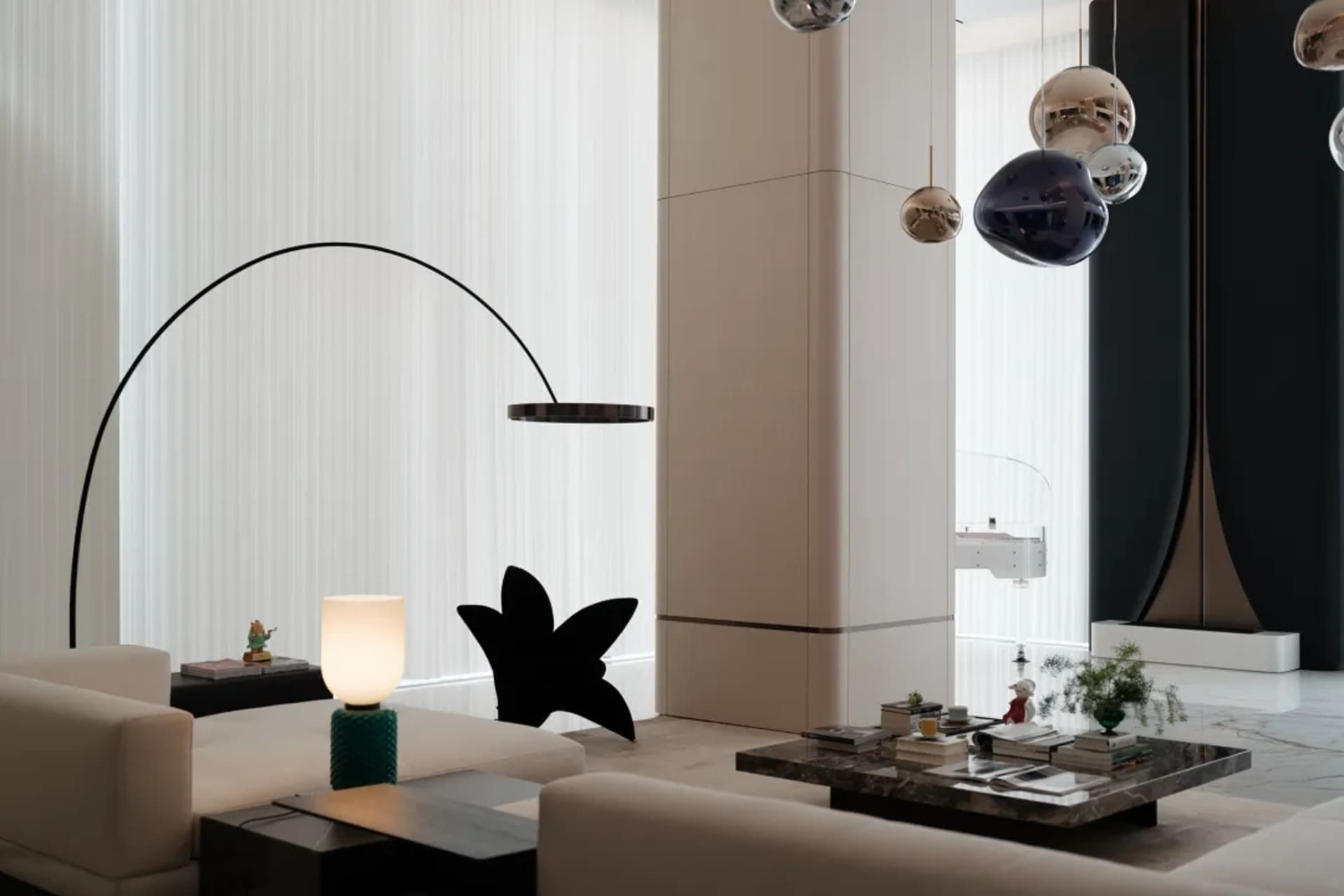 A modern minimalist living space with sleek, contemporary furniture and minimal decor.