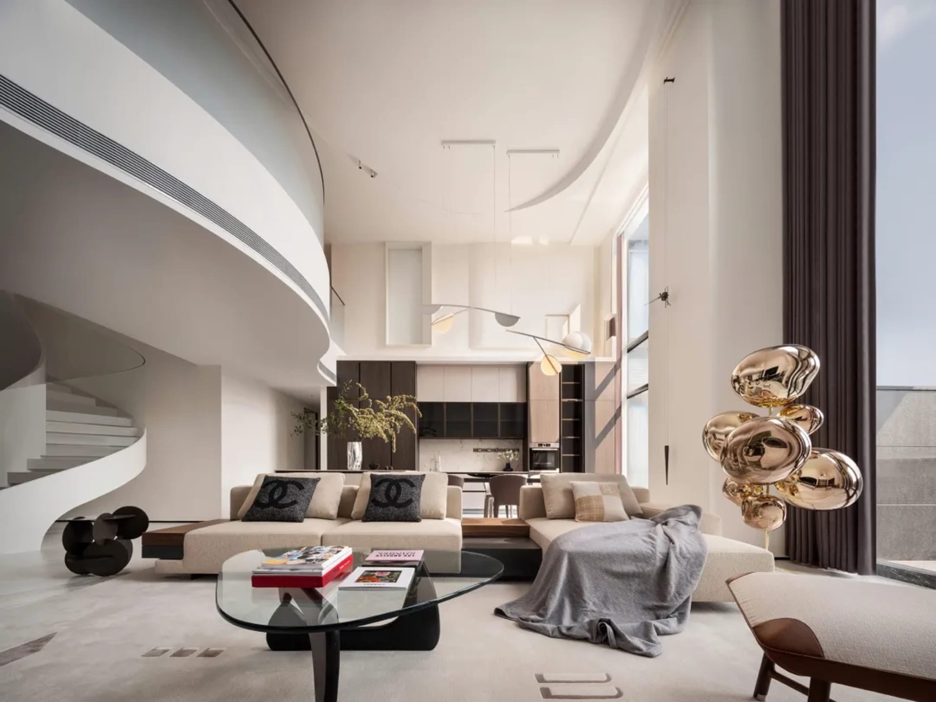 Modern living room with an open-plan design featuring neutral tones and materials.