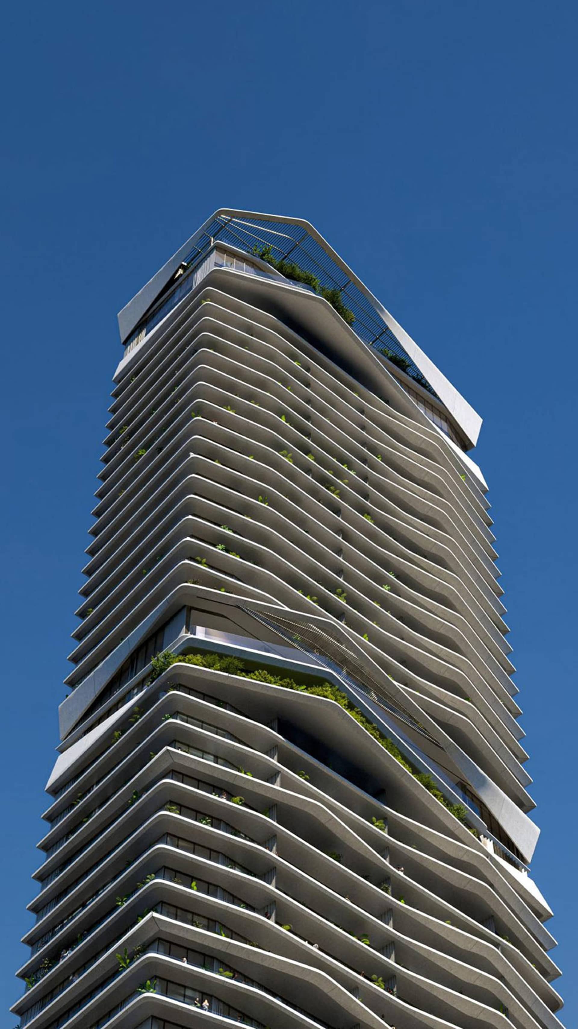 一座現代高層建築,外牆由混凝土與玻璃構成