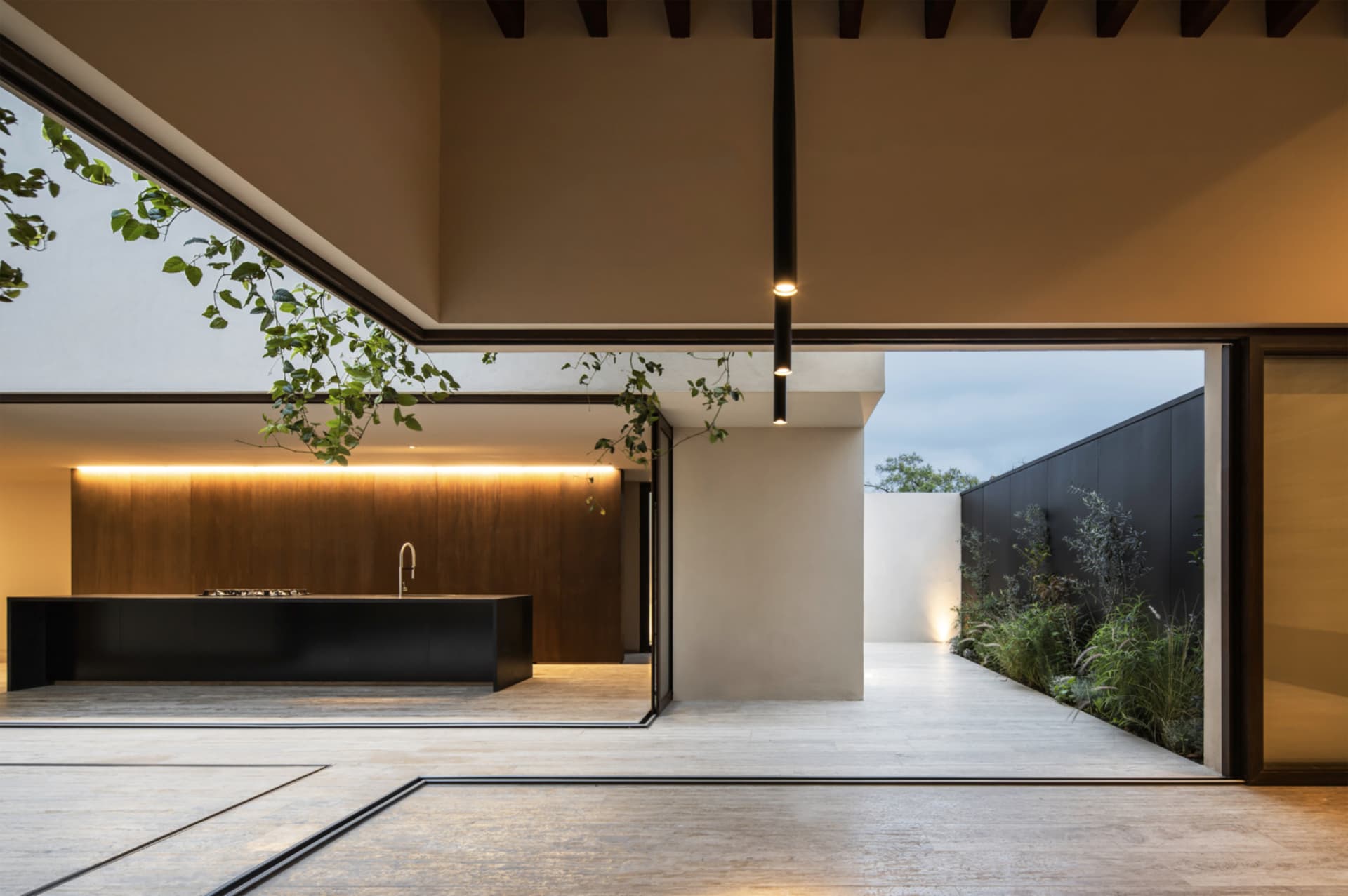 Modern residential kitchen featuring concrete materials
