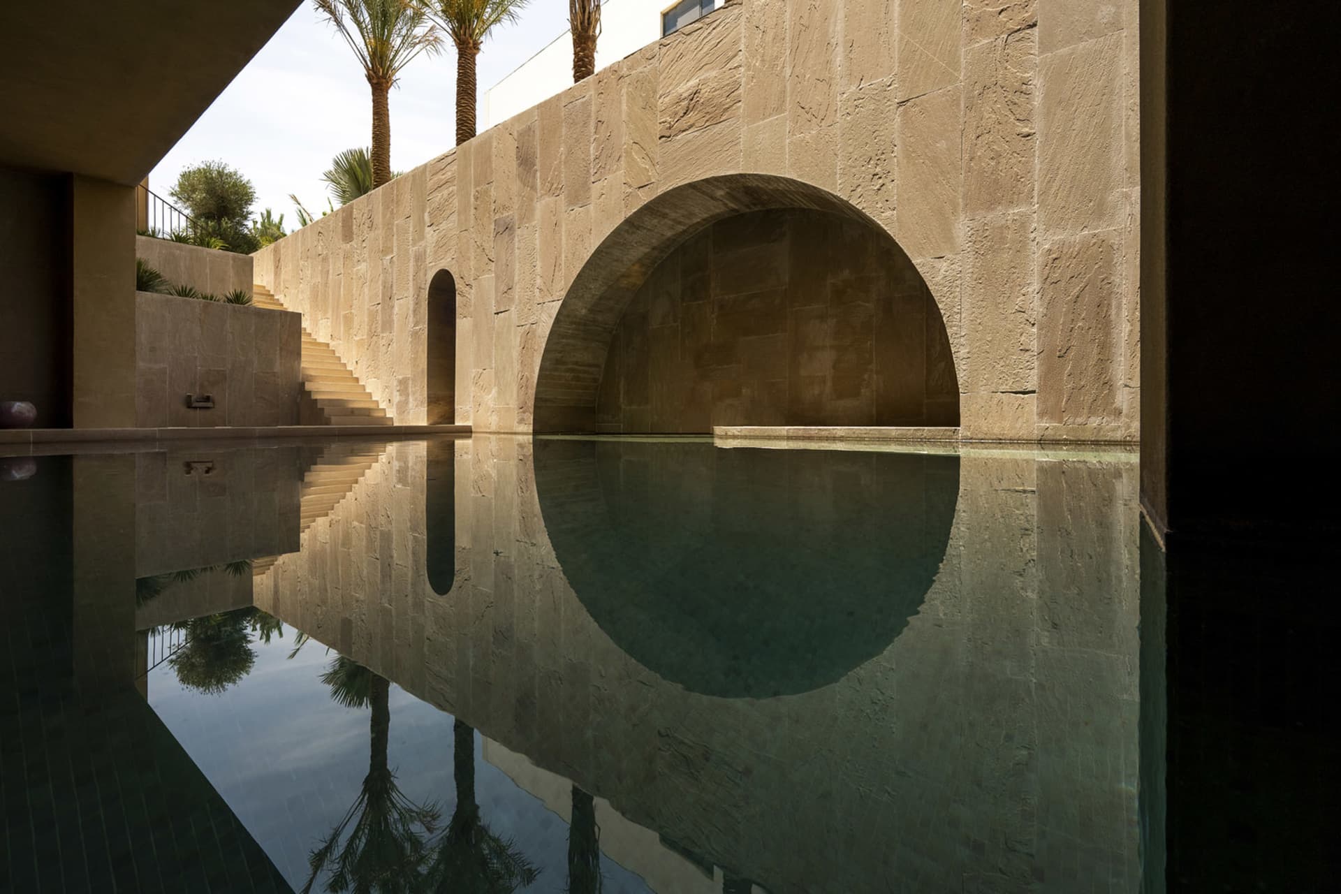 A modern architectural feature constructed of concrete.