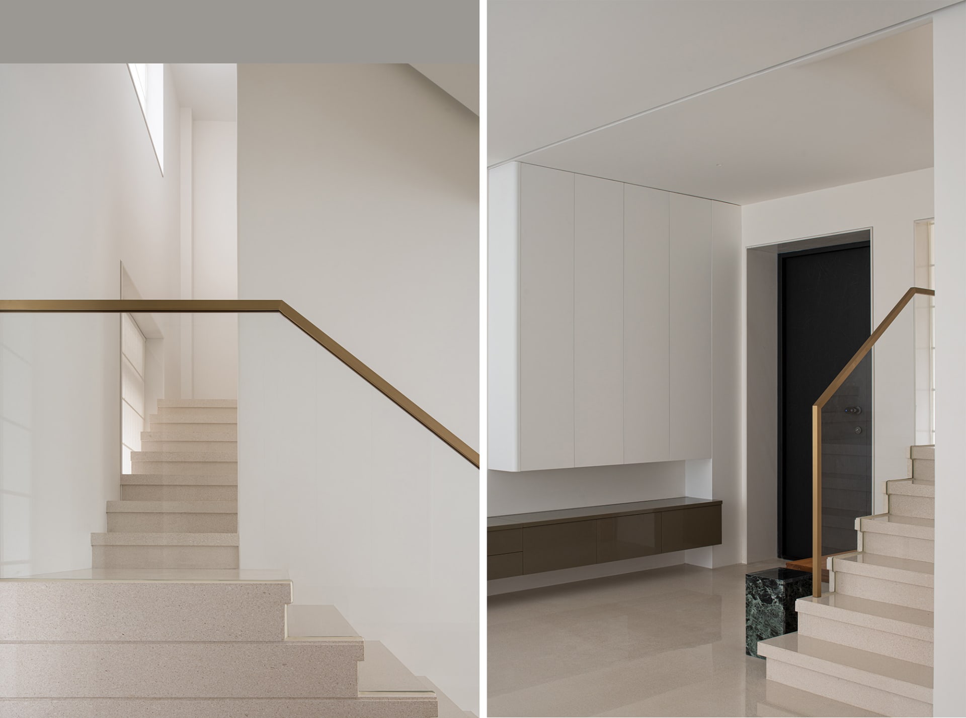 Modern white concrete staircase with gold aluminum railings and black door in an interior space with minimalist design elemen