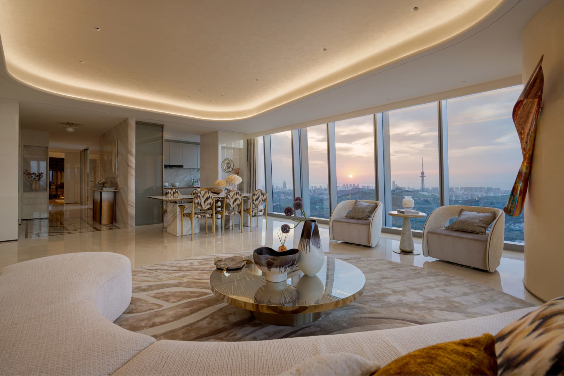 A modern living room with marble flooring, glass walls, and a city view.