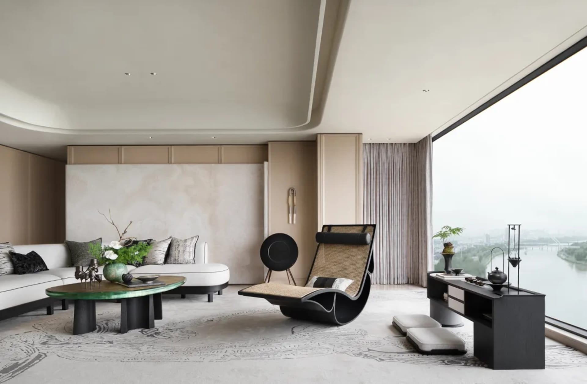 Modern living room featuring a leather sofa, glass table, and wooden elements.
