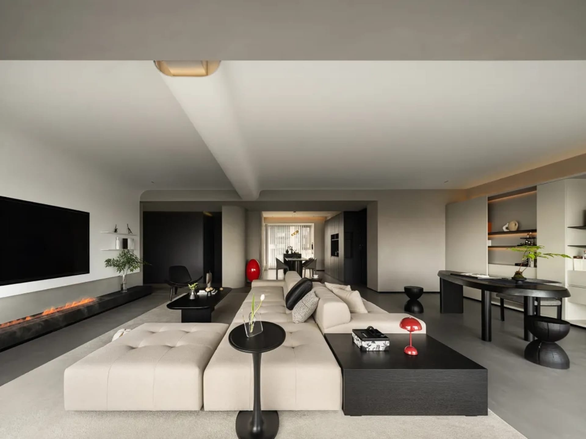 Modern living room featuring a neutral color palette and minimalist design.