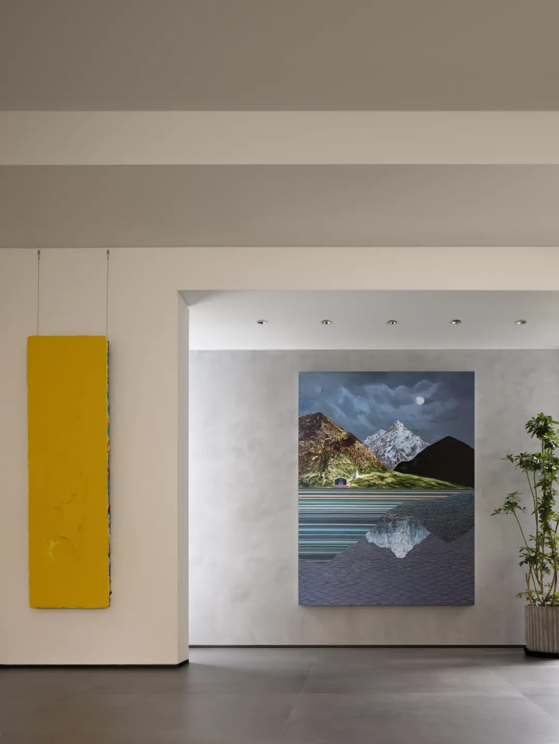 A modern interior design featuring a furniture layout with wall paintings.