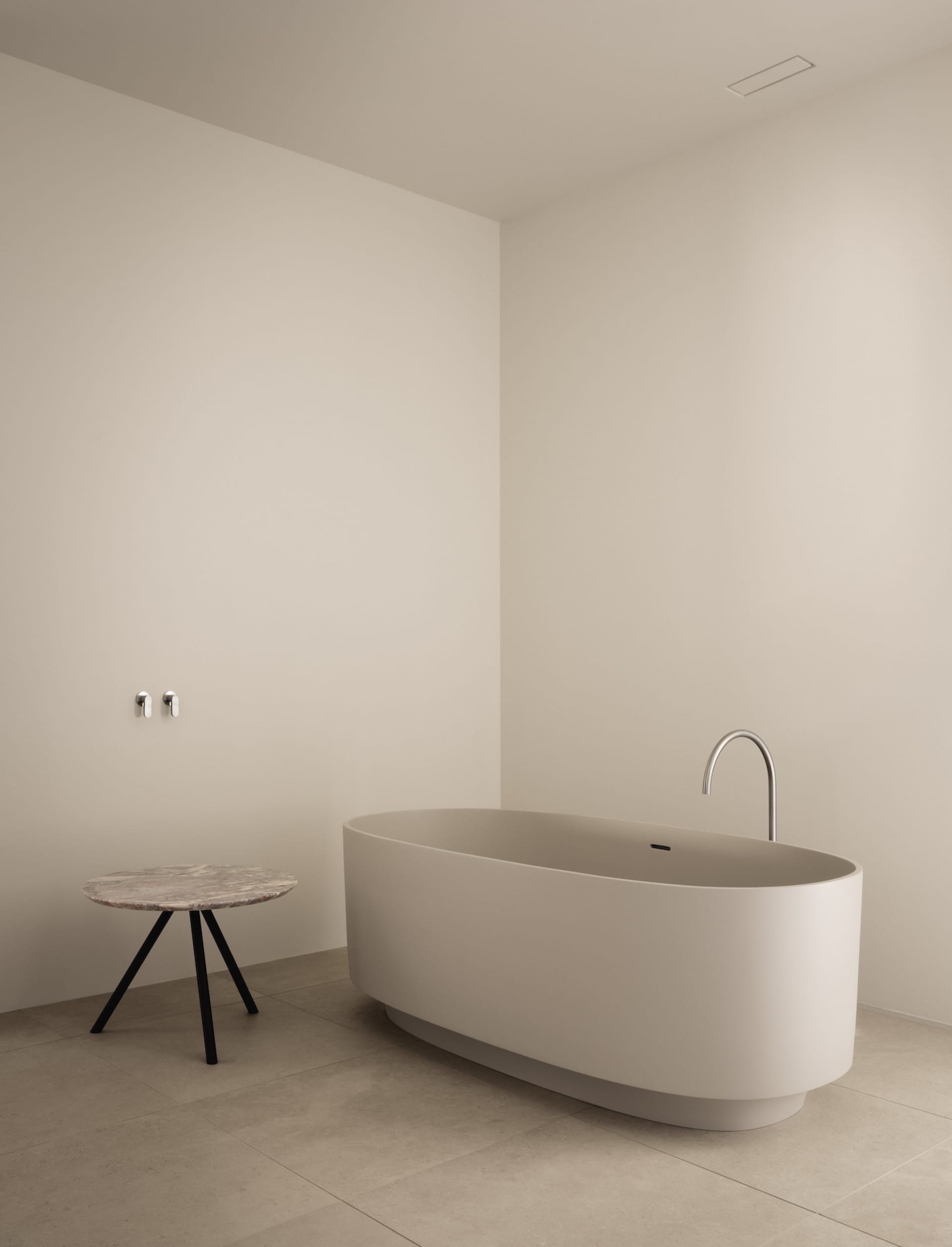 A modern, minimalist bathroom renovation showcasing sleek, white fixtures, clean lines, and an overall airy feel.