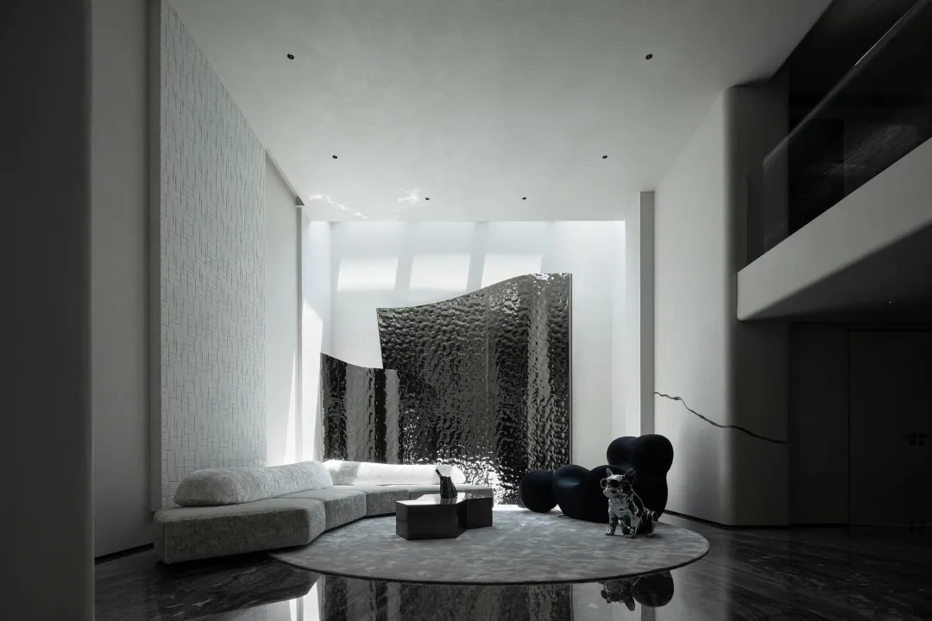 A minimalist living room with a metallic, textured backdrop and a circular rug with a white sofa and black accents.