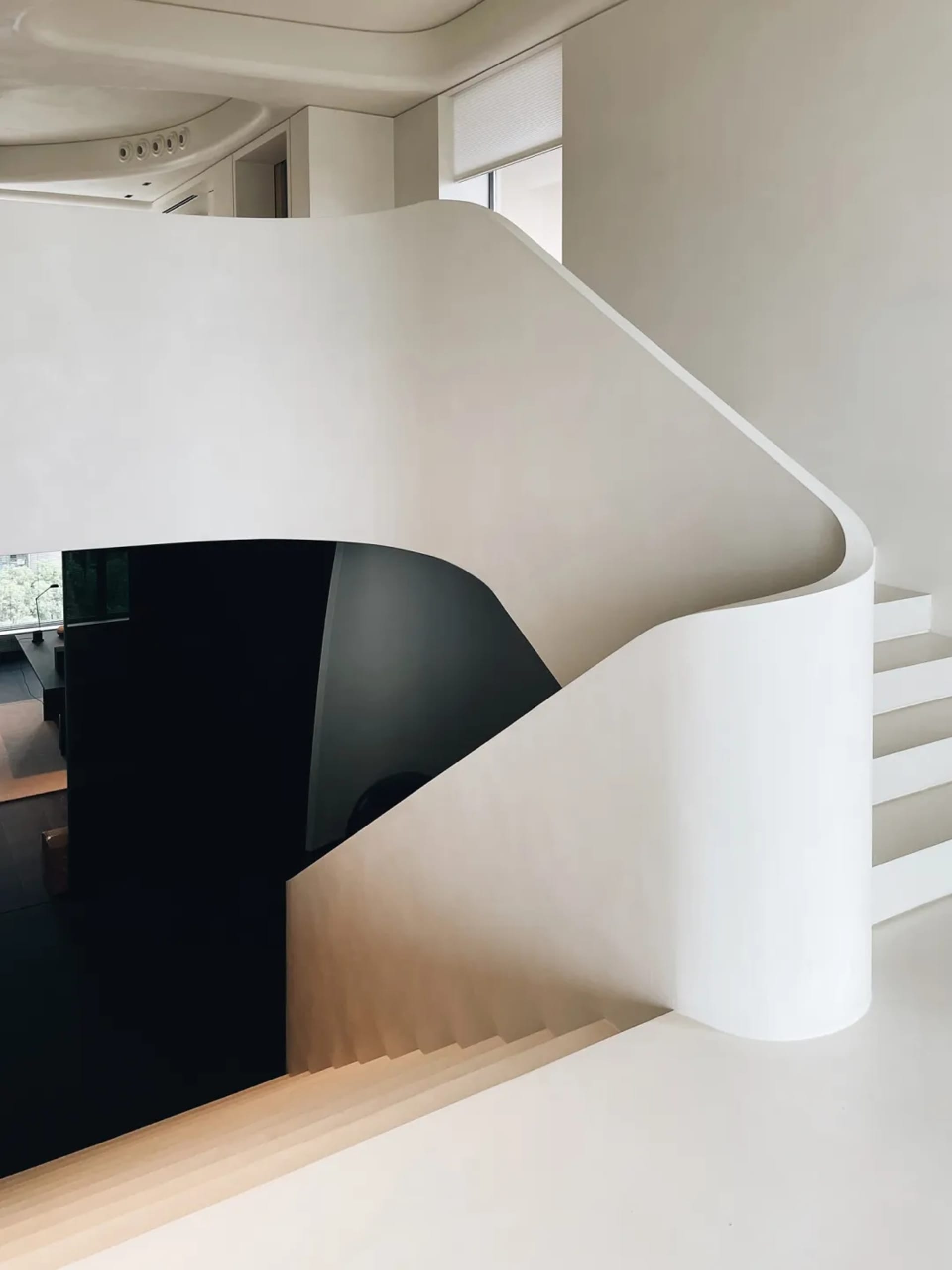 White curved white wall in a modern interior design setting