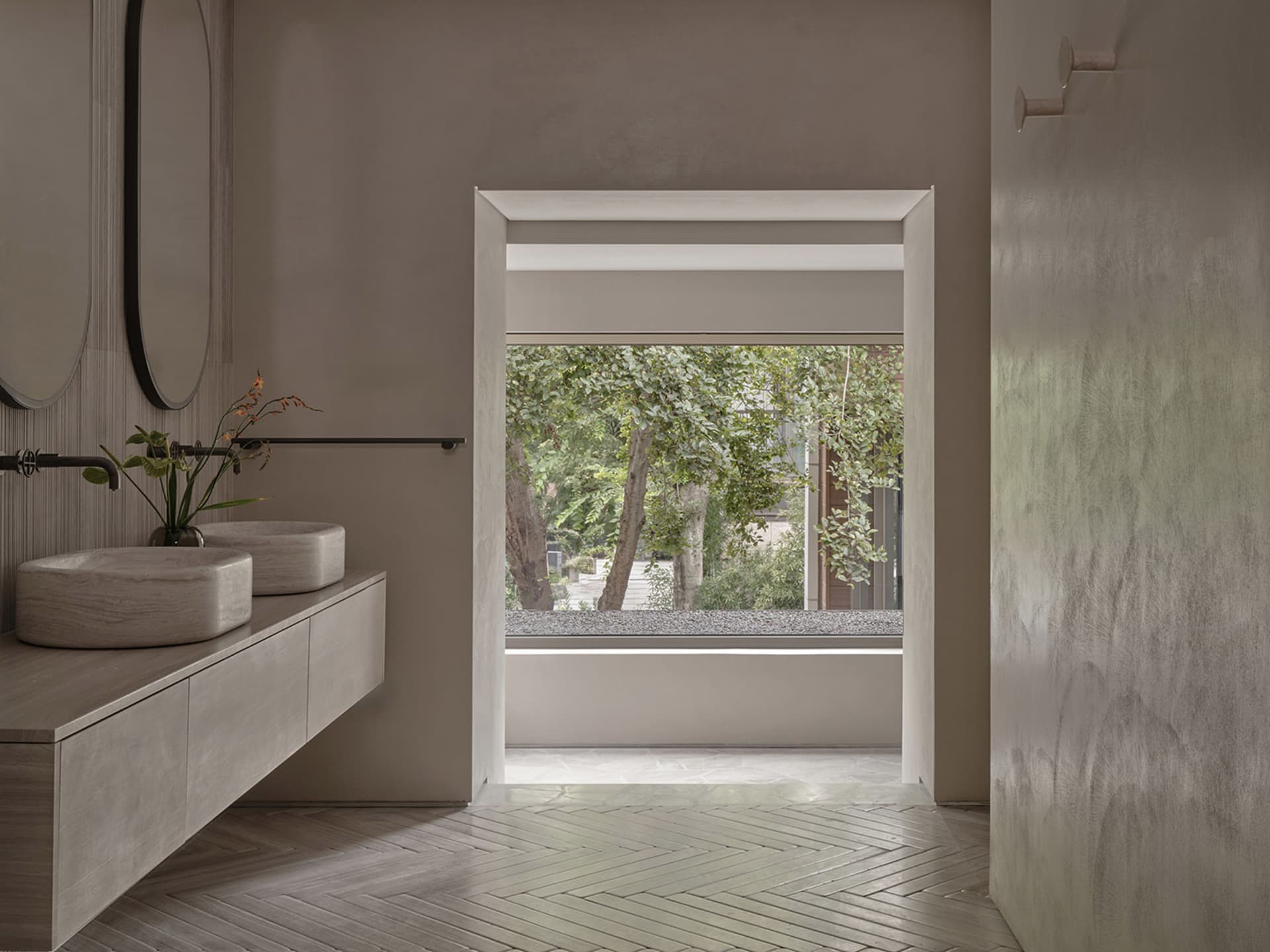 Modern minimalist bathroom with concrete and plaster finish