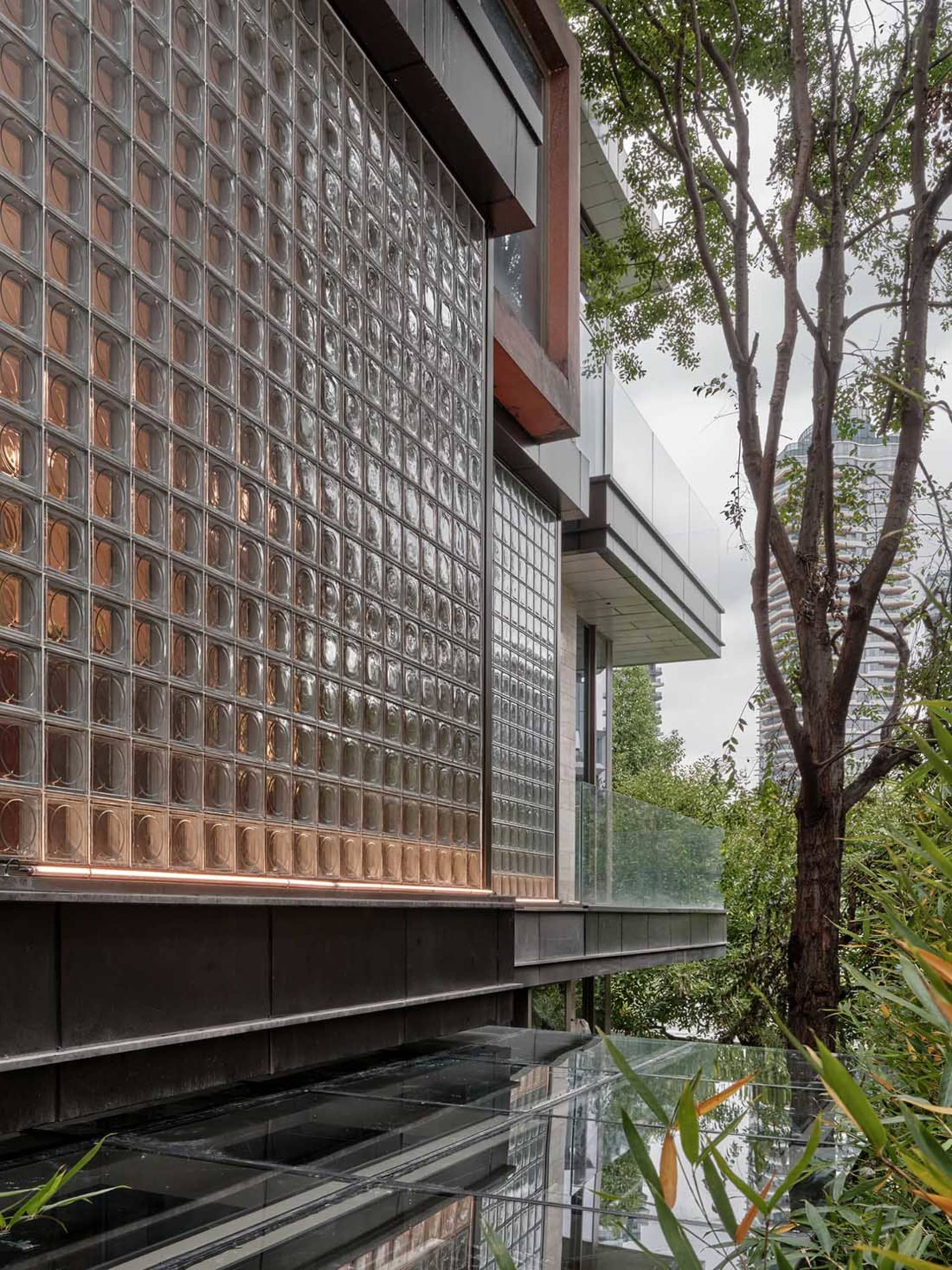 Modern building exterior featuring glass blocks with a contemporary design.