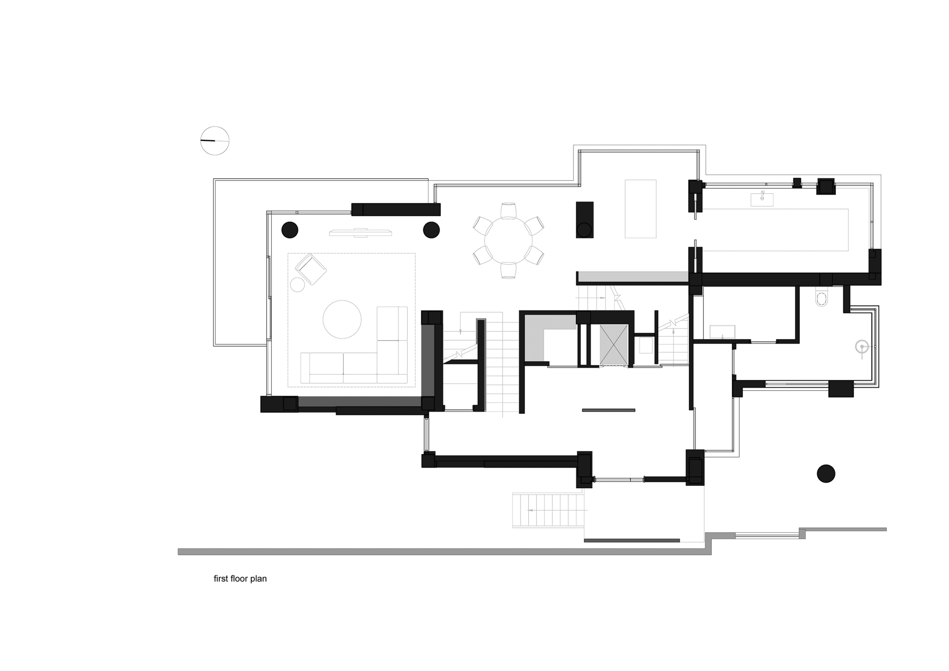 一張詳細的黑白建築圖，呈現現代設計元素的住宅平面配置。