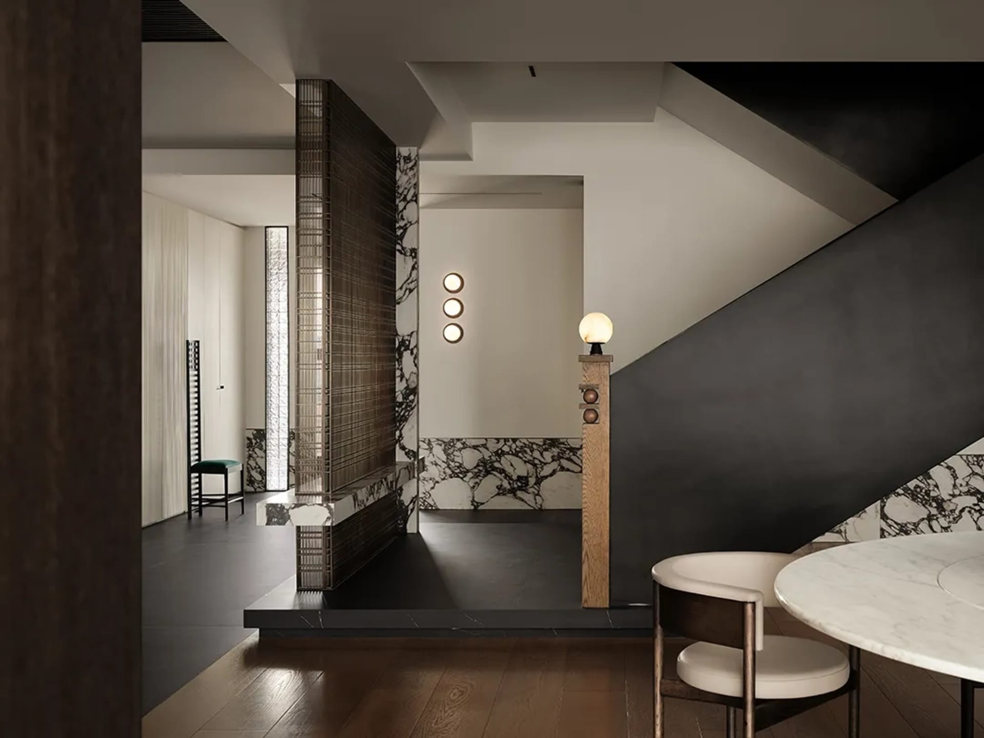 Modern interior living space with marble and concrete materials.