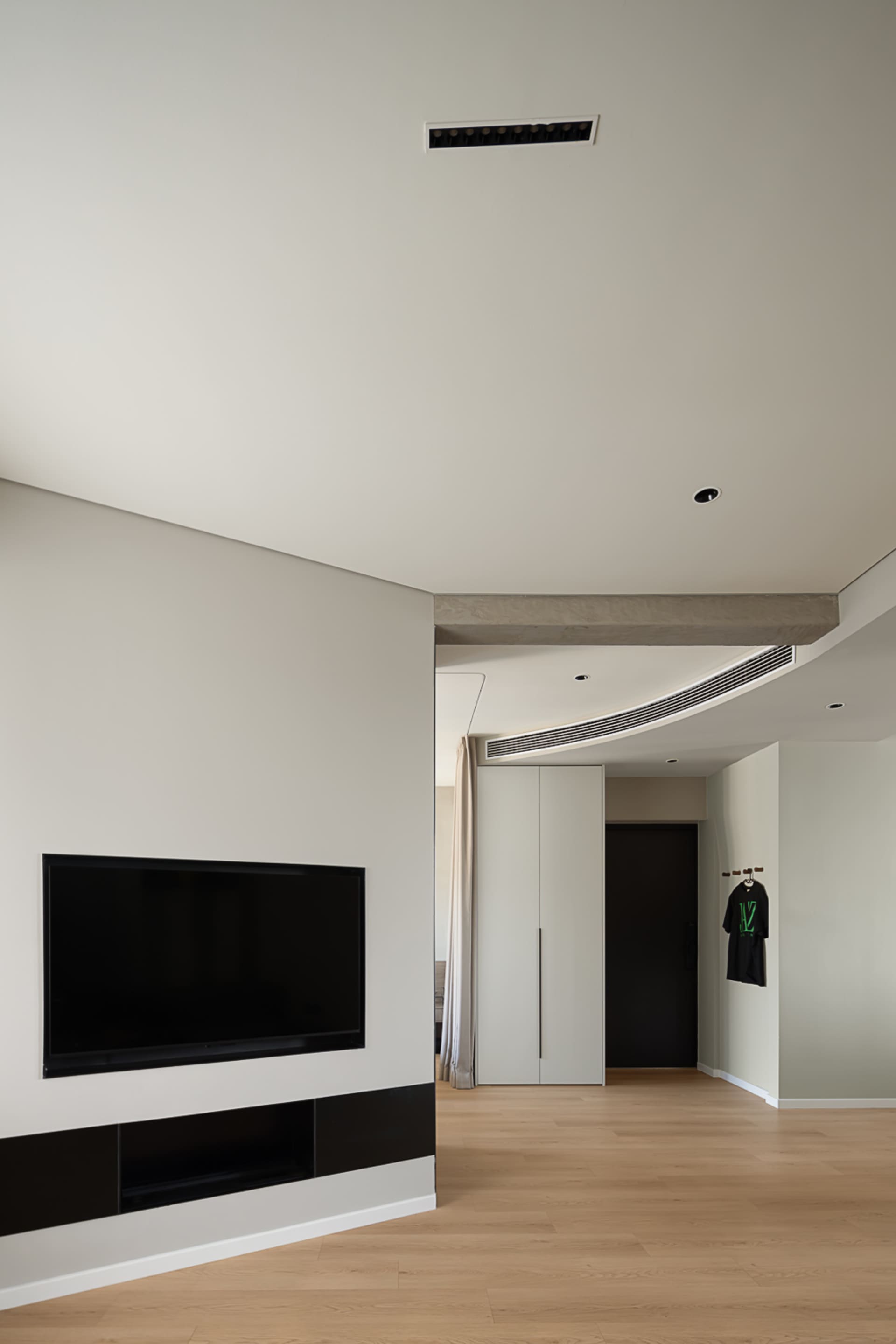 Modern living room featuring wooden furniture and minimalist decor