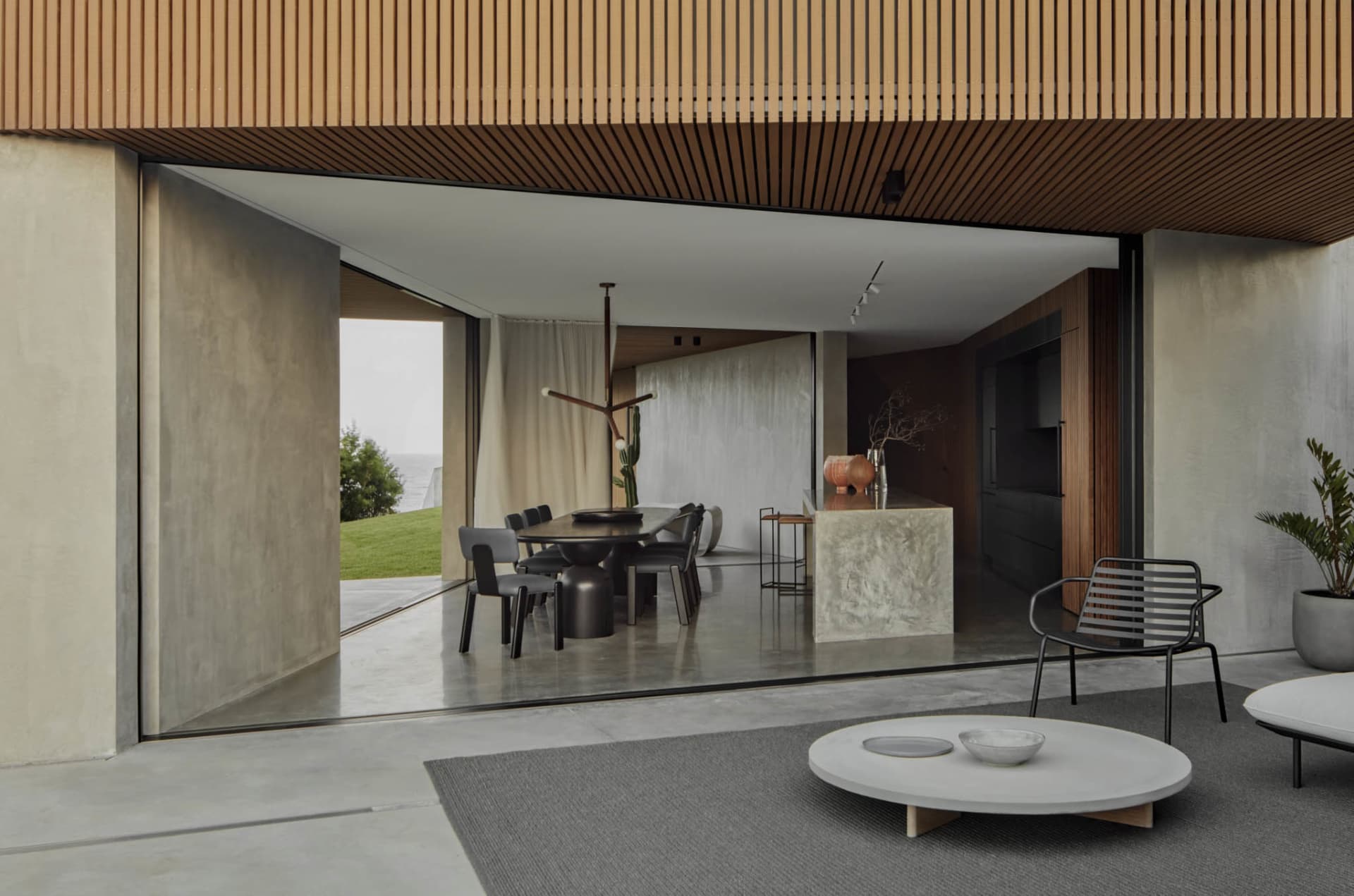 Modern residential interior with concrete and wooden materials