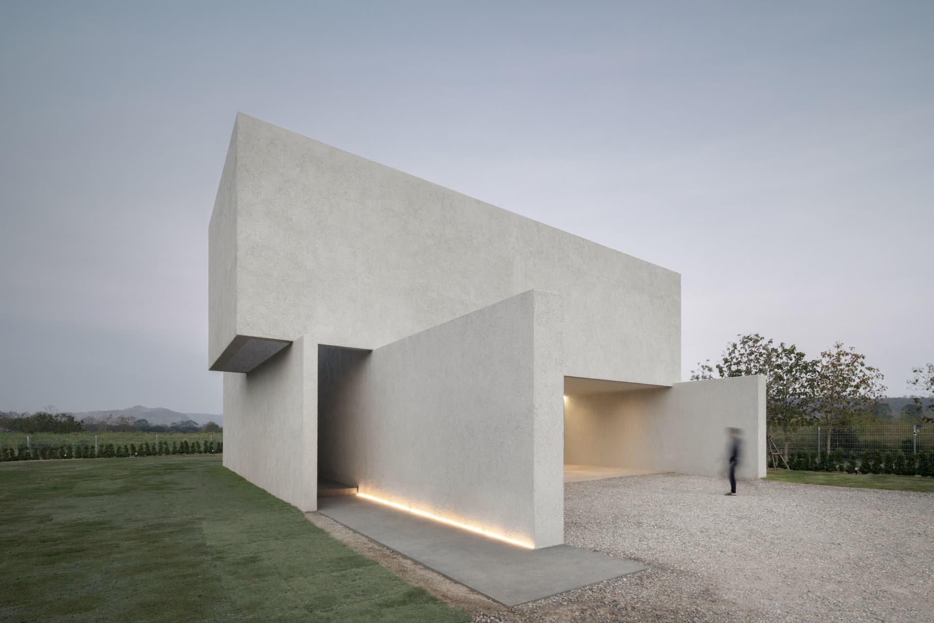 A modern building made of concrete with minimalist design.