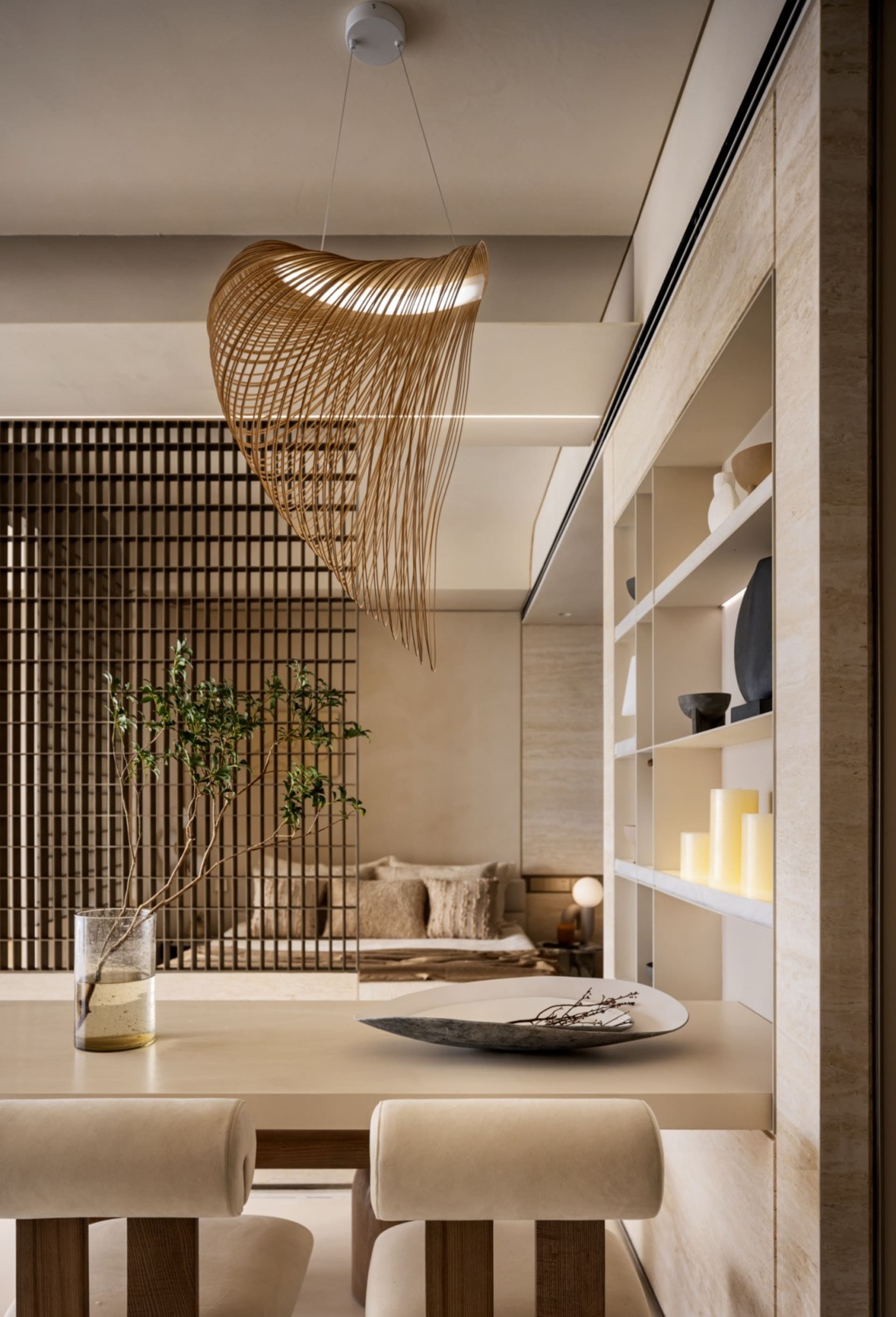 Minimalist dining room featuring concrete and wooden elements, with a modern chandelier and decorative elements.