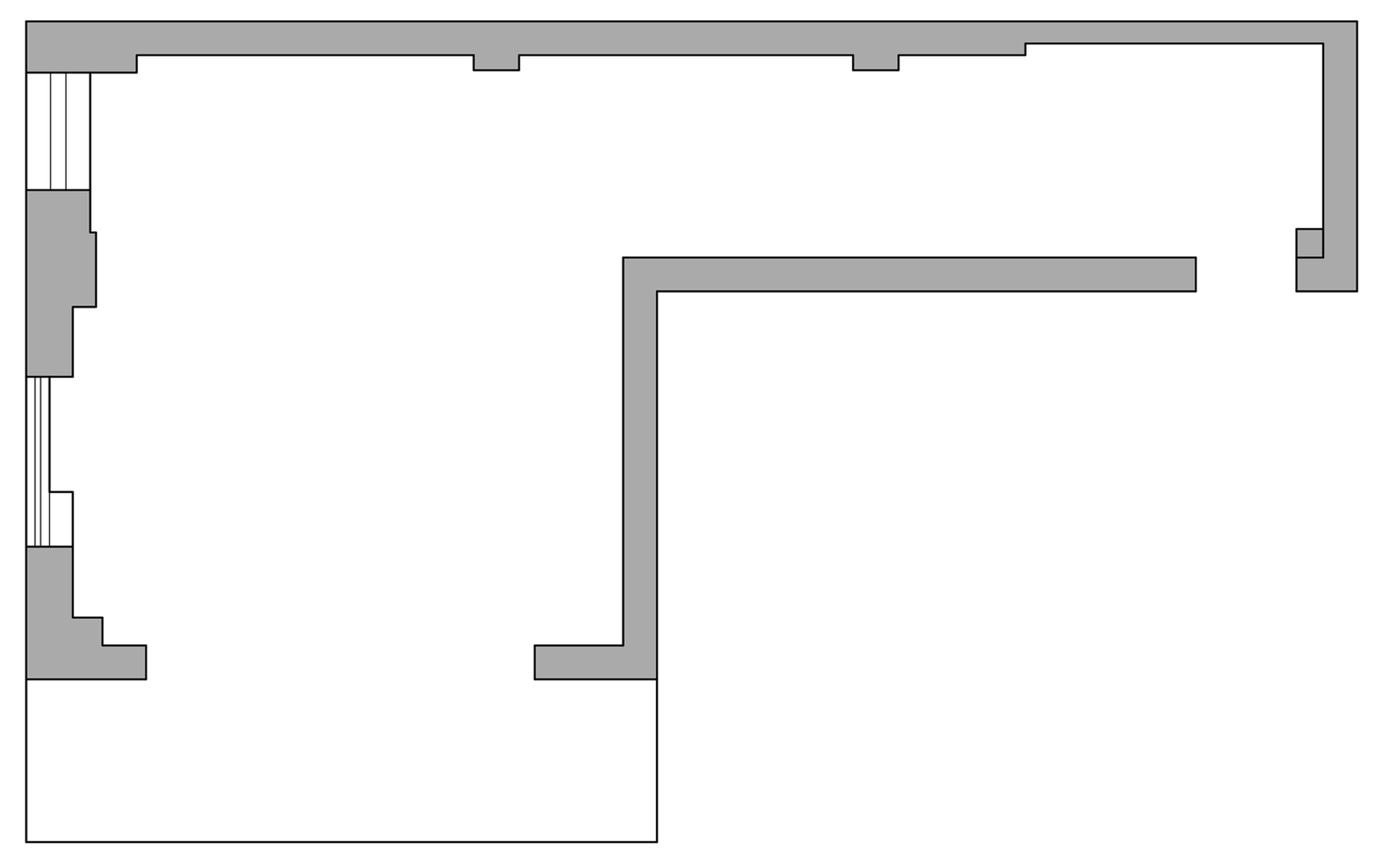 A compartmentalized architectural space with carpet tiles and concrete base