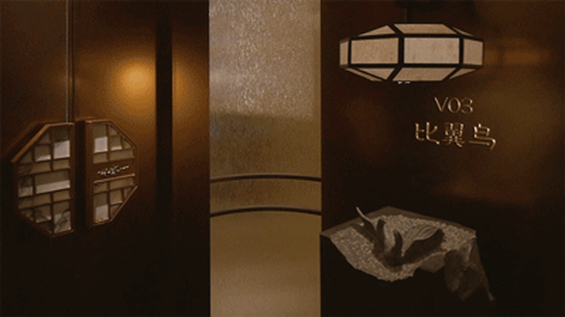 Hotel lobby entrance with hanging metal lamp fixture
