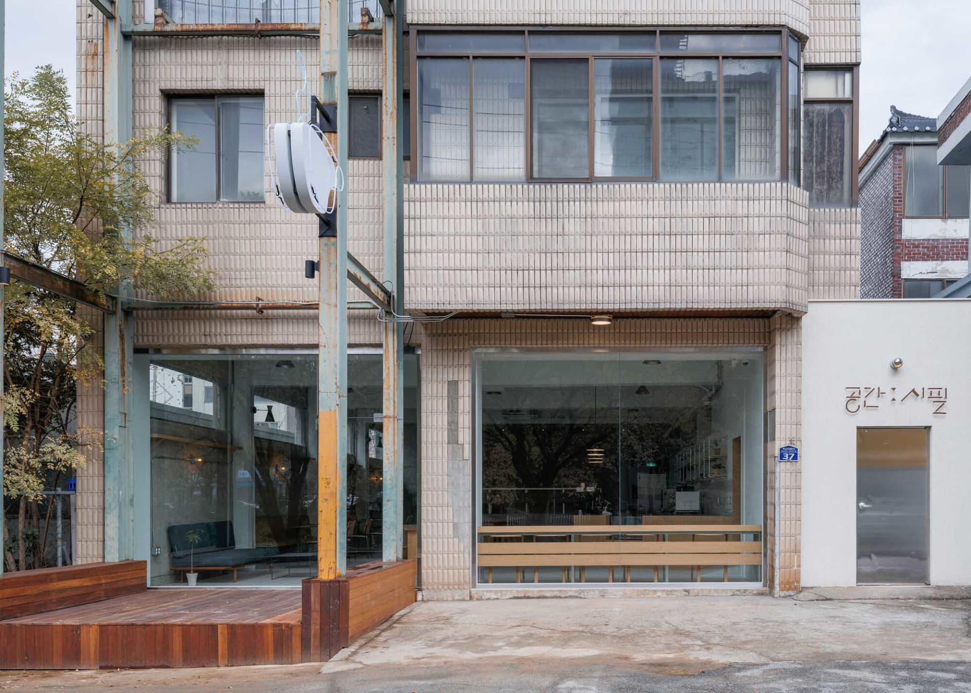 A modern commercial space with glass windows showcasing contemporary architecture.
