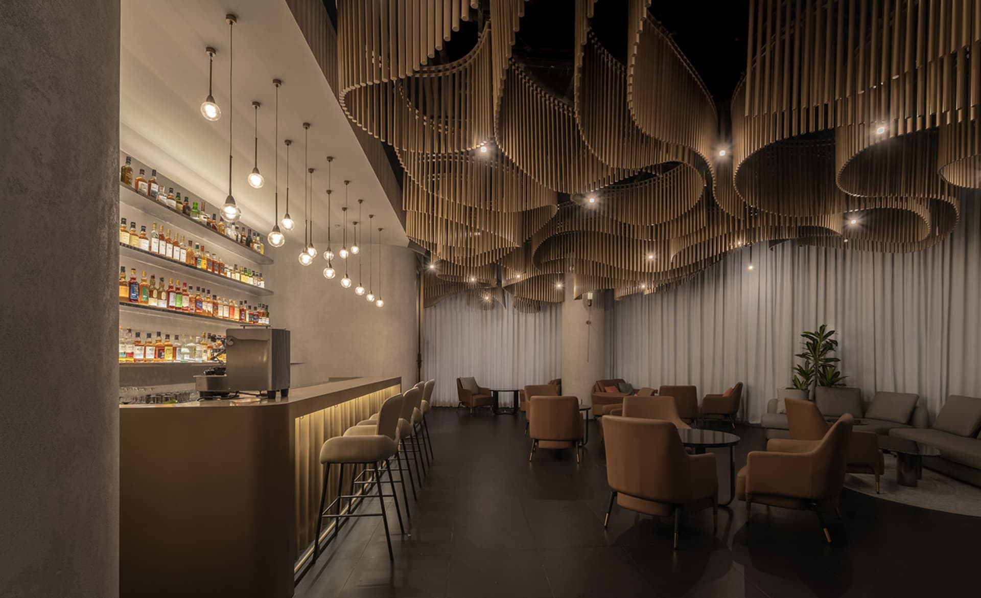 Modern industrial lounge bar with wooden decor and hanging lights
