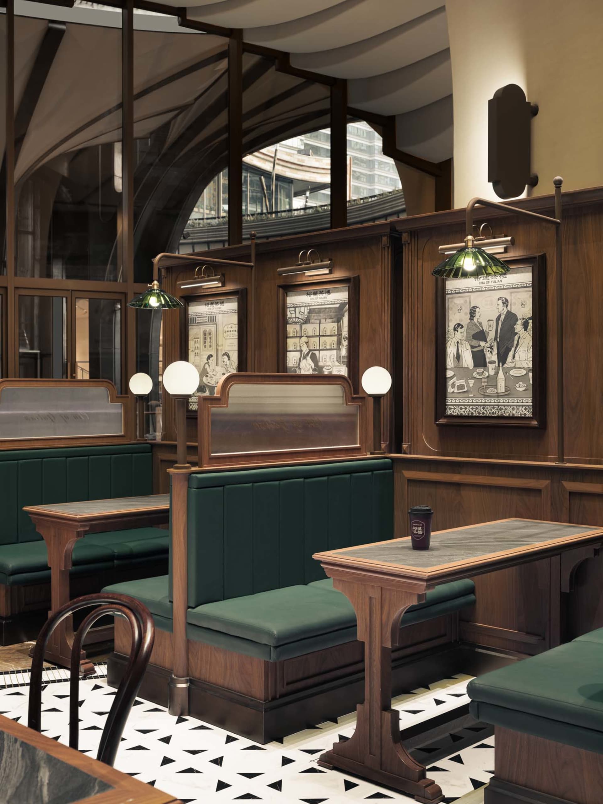 A cozy wooden cafe interior with plush leather benches.