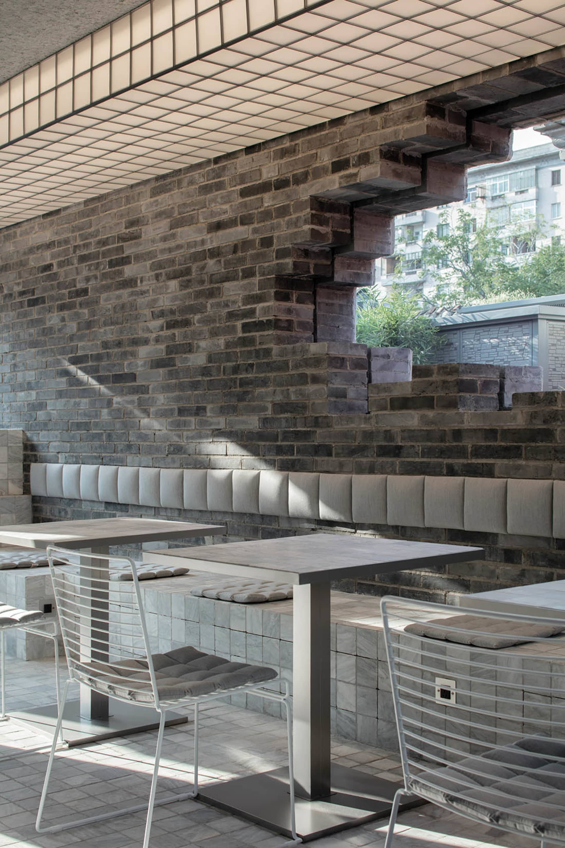 Modern cafe interior with steel and brick materials