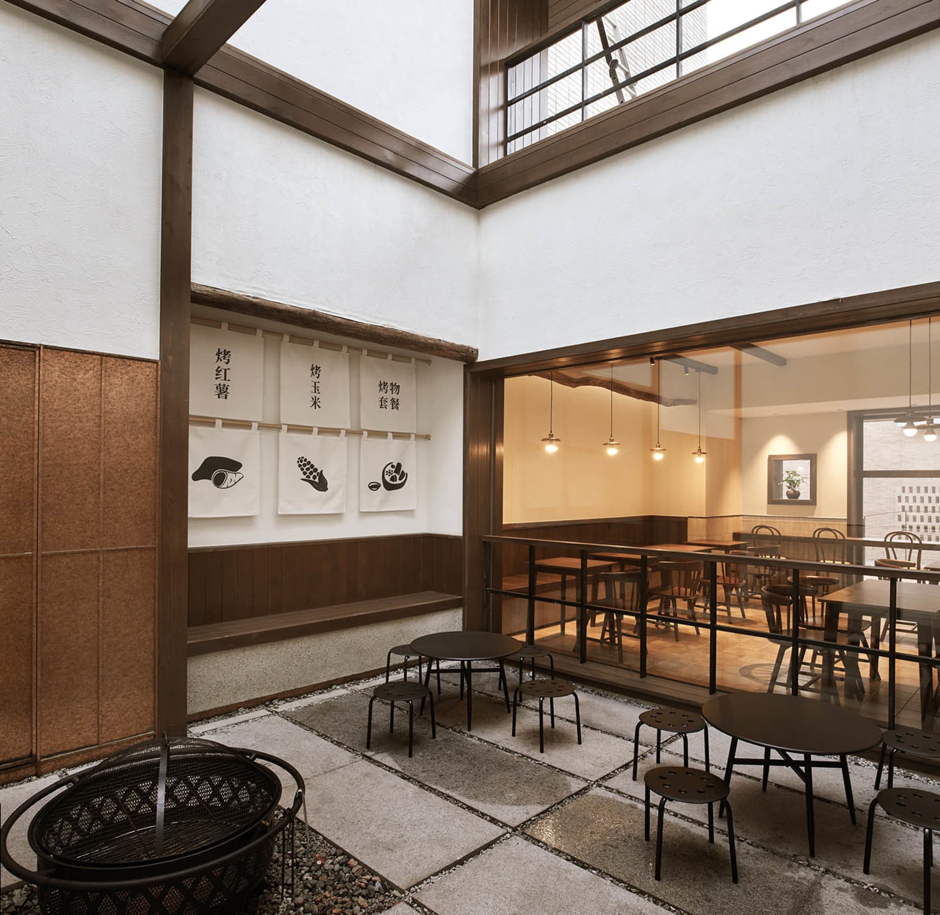 Modern coffee shop interior with wood and concrete features
