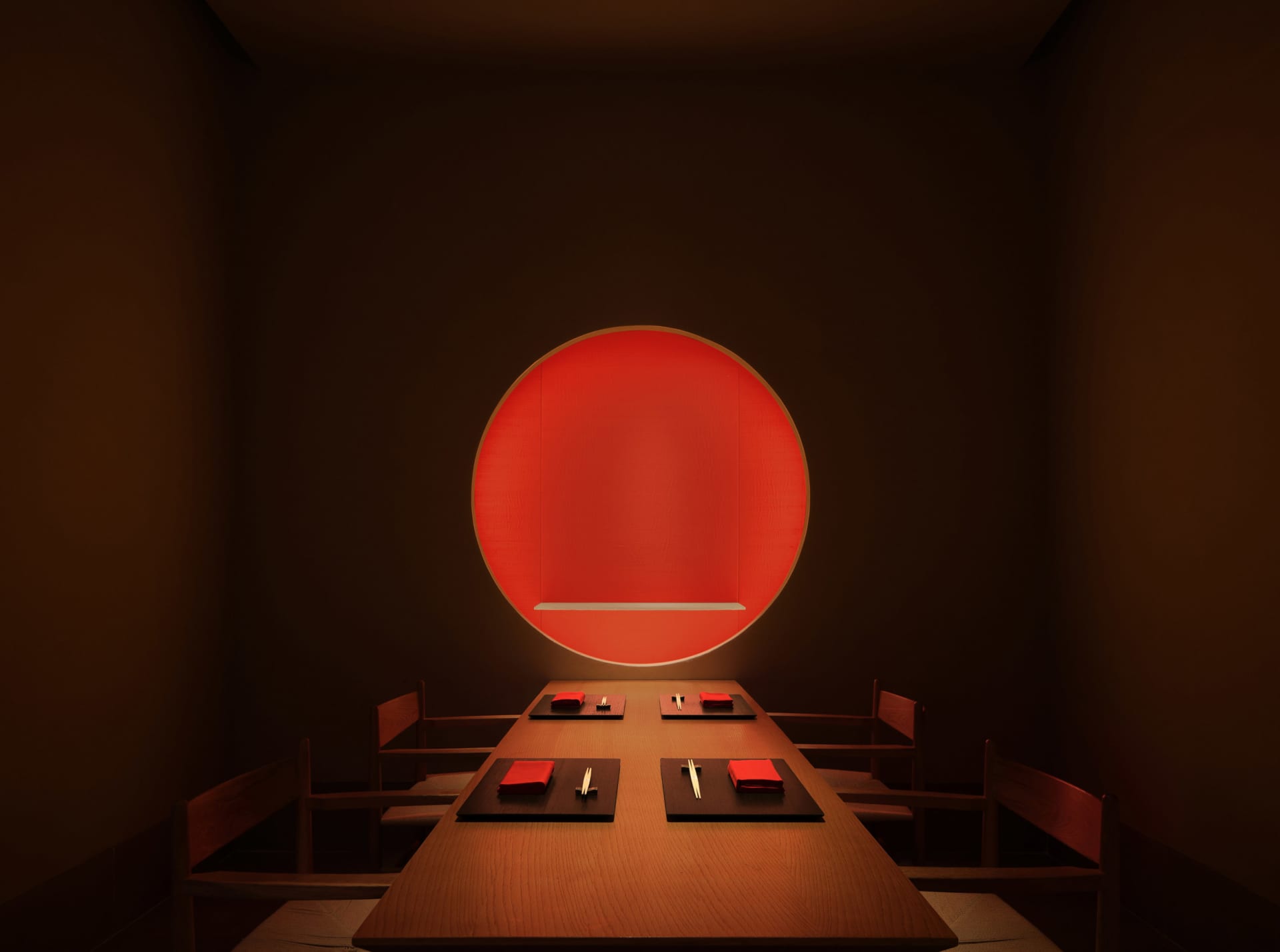 Modern dining room with a wooden table and chairs.