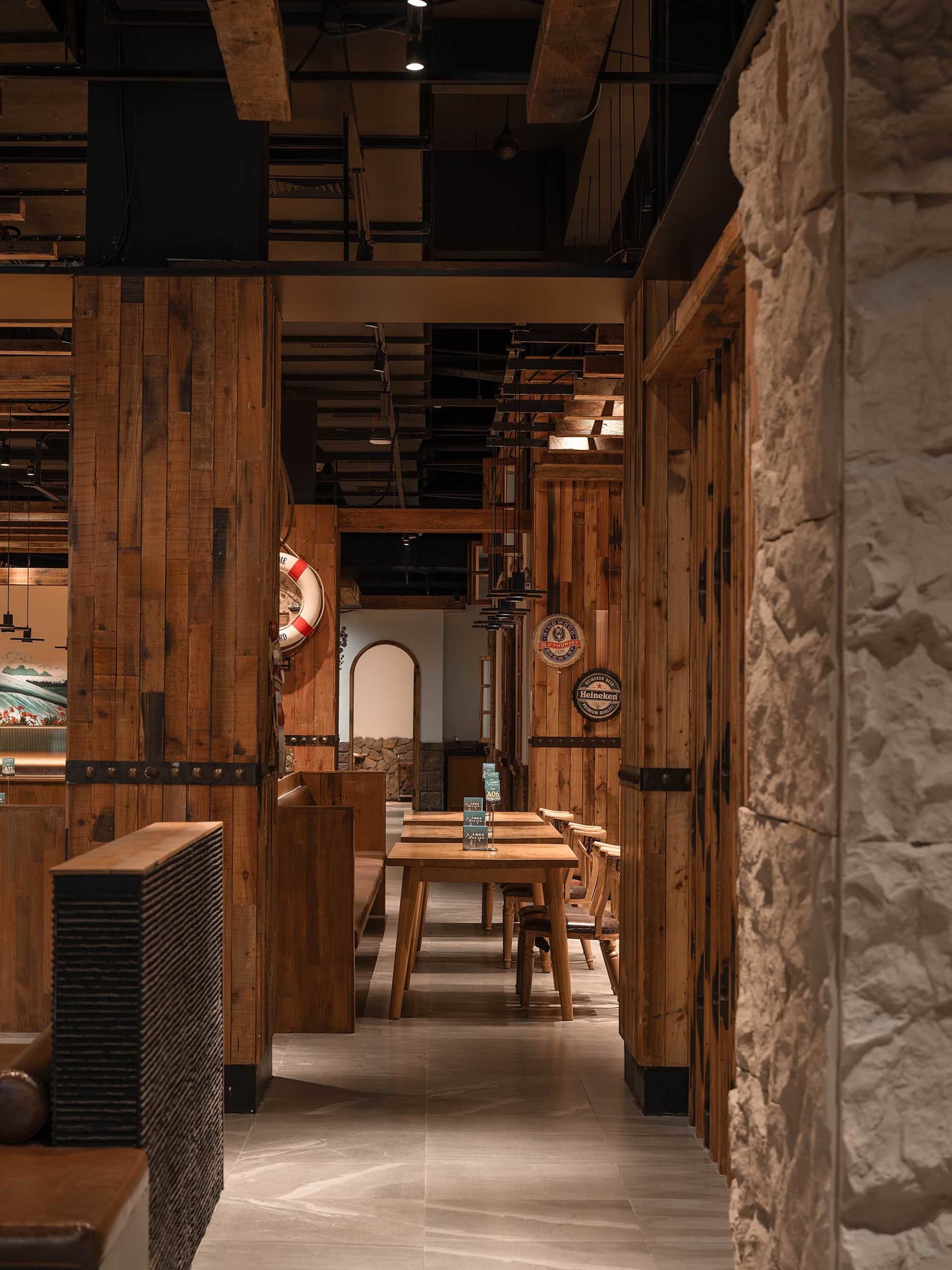 Industrial-themed retail storefront with wooden paneling and rustic decor.