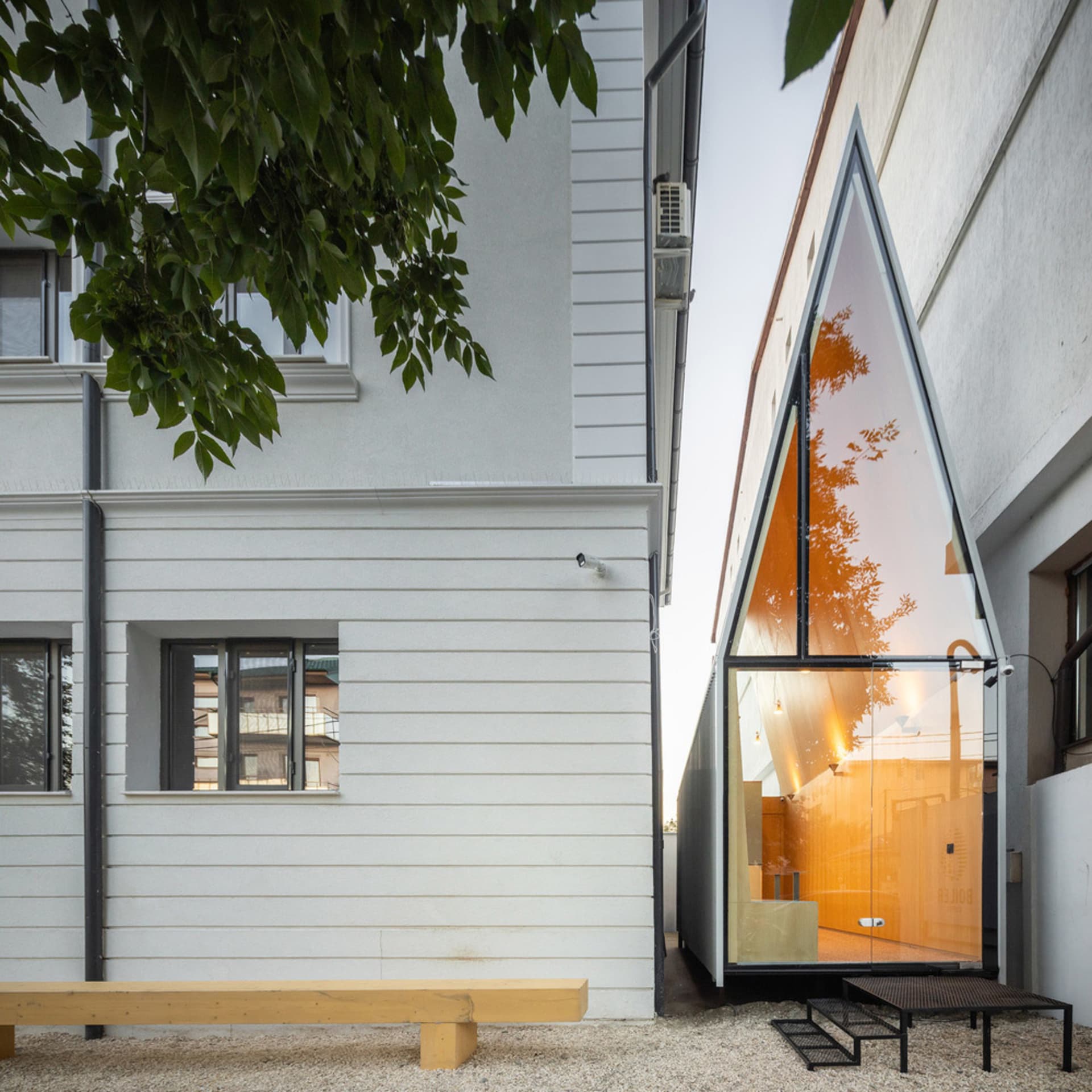 Modern house extension featuring a glass extension.