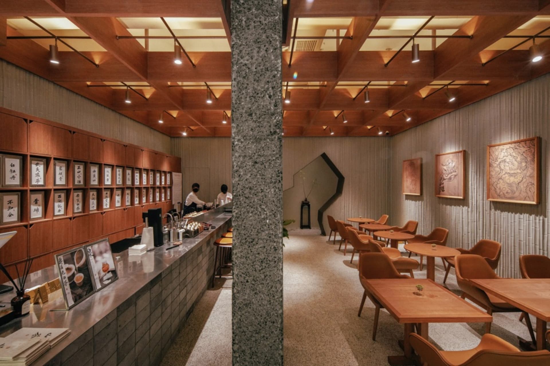 Modern restaurant interior with concrete and wood elements