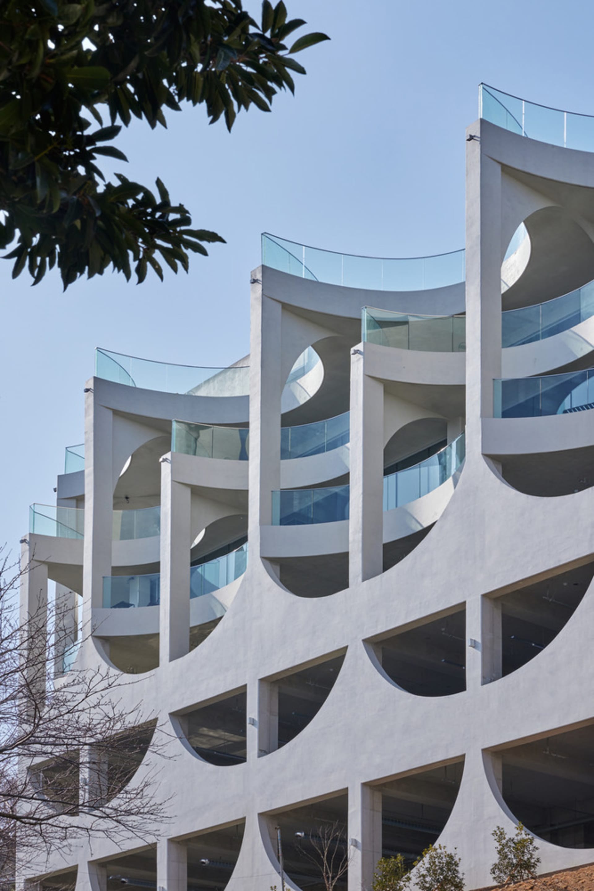 Modern building facade constructed from concrete materials.