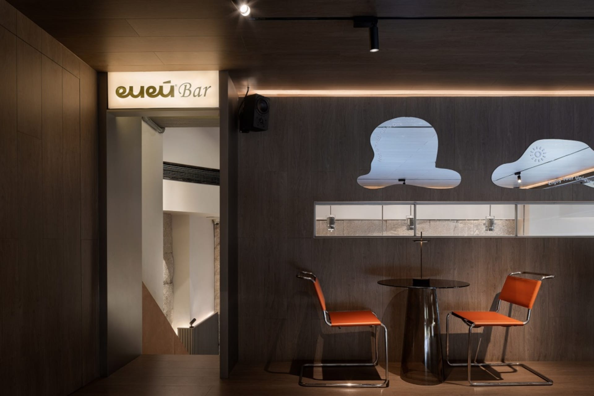 Modern restaurant interior with industrial design elements in metal and wood
