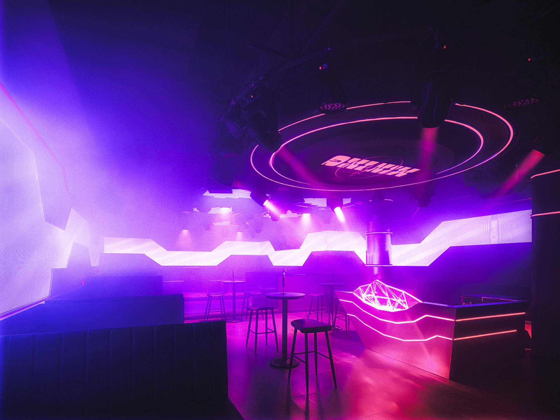 A vibrant, futuristic nightclub interior with LED lighting materials and futuristic design elements.