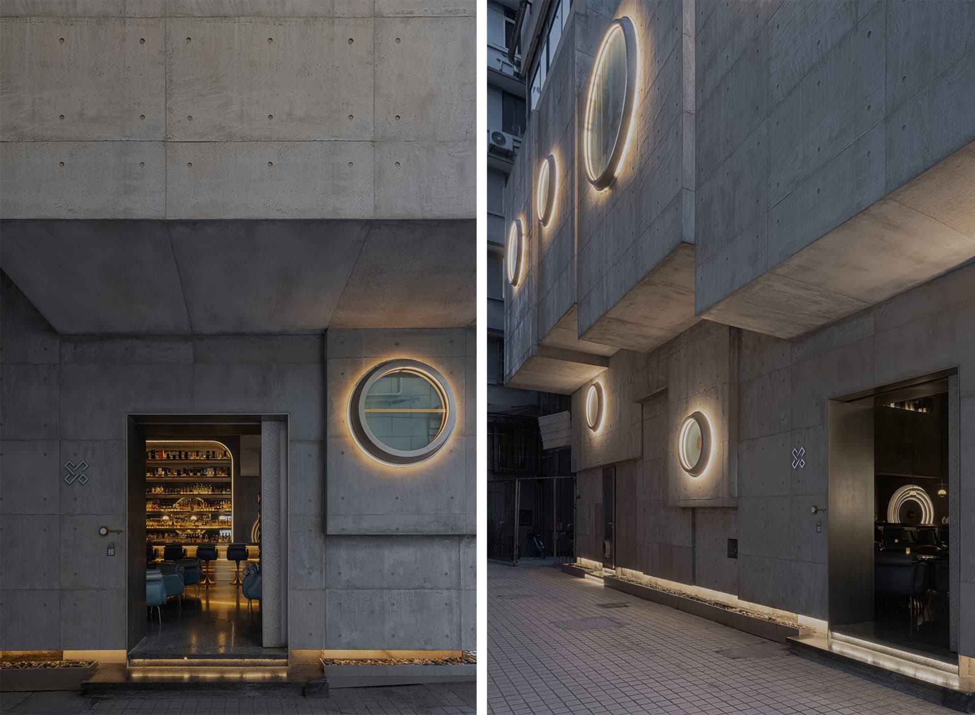 A modern industrial bar with a large concrete window at night, featuring a minimalist design with metallic accents and a lit 