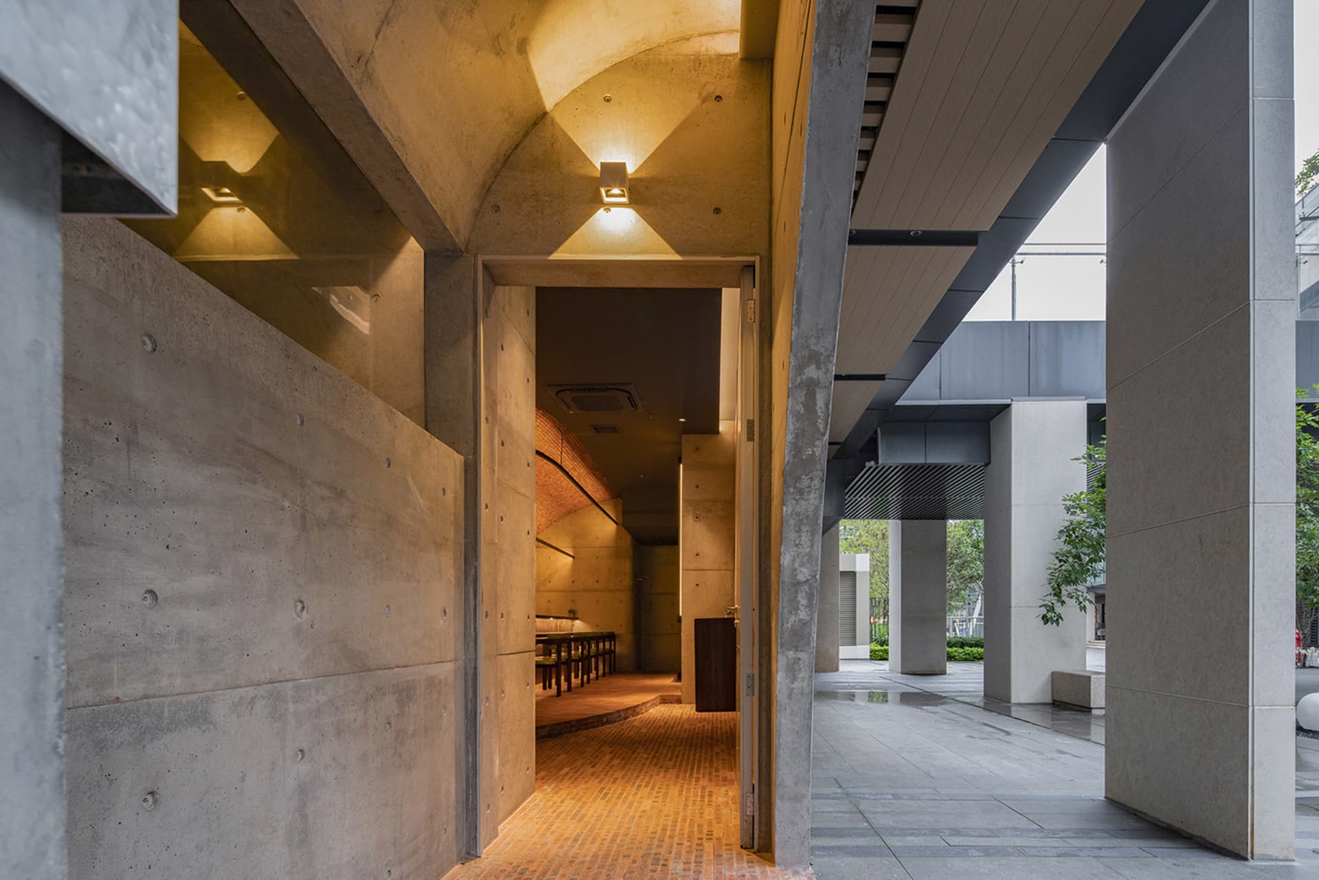 An image showcasing the design of a modern commercial interior with concrete materials.