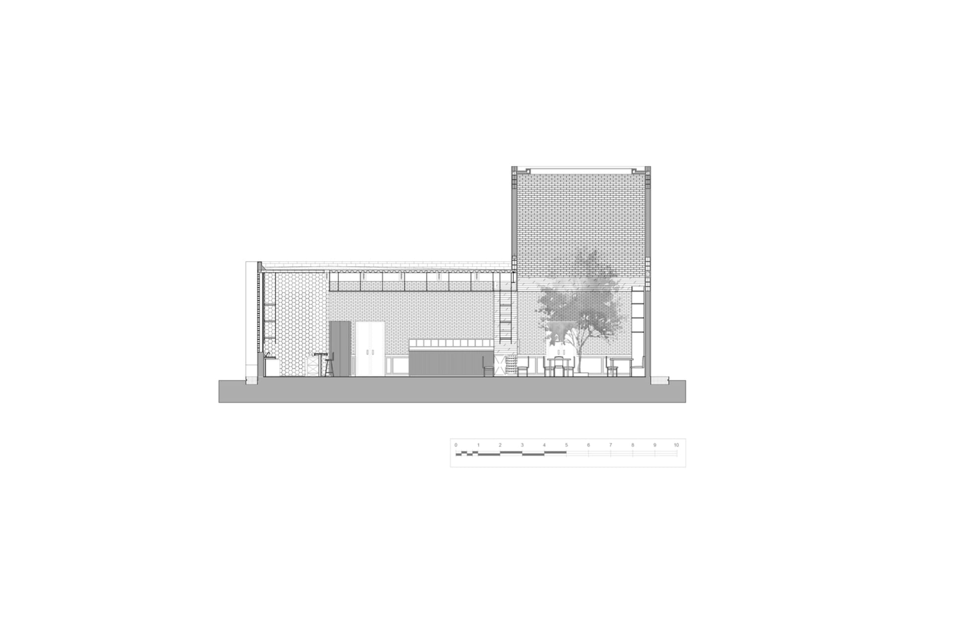 An architectural drawing of an industrial-style restaurant interior, featuring brick and concrete materials and a layout that