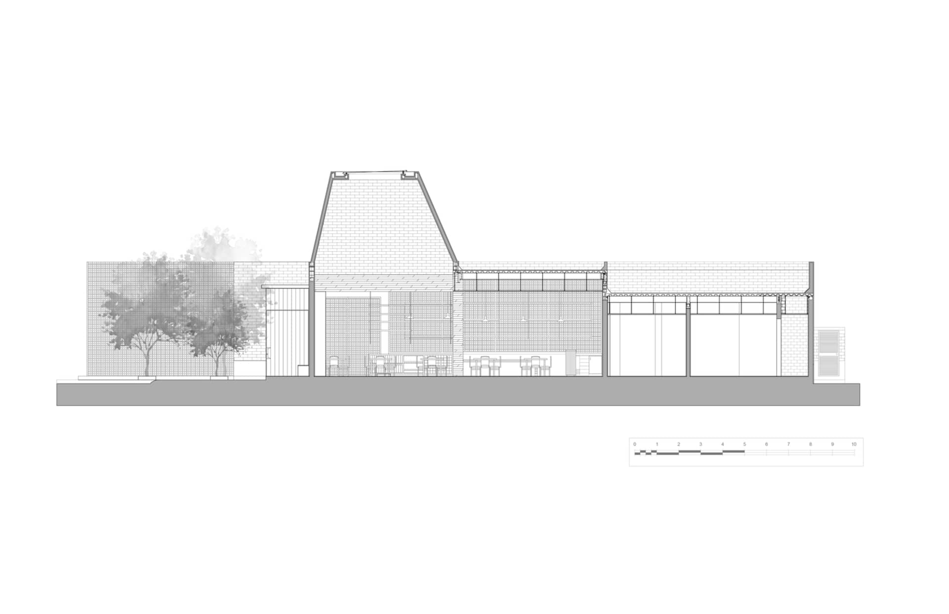 Floor plan showing the interior design of a modern shop featuring steel, glass, and brick materials.