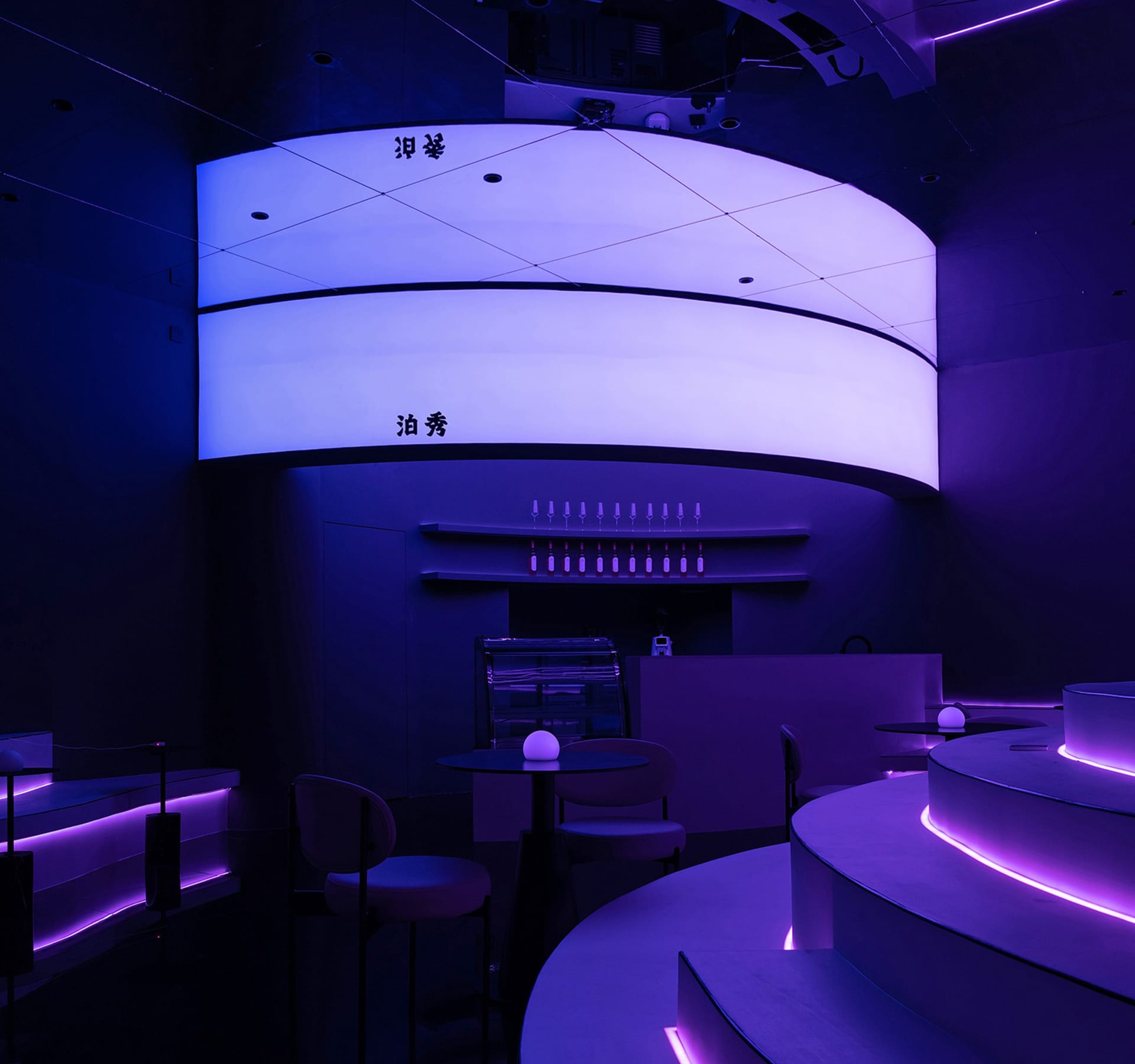 Industrial-themed casino interior with concrete walls and lighting.