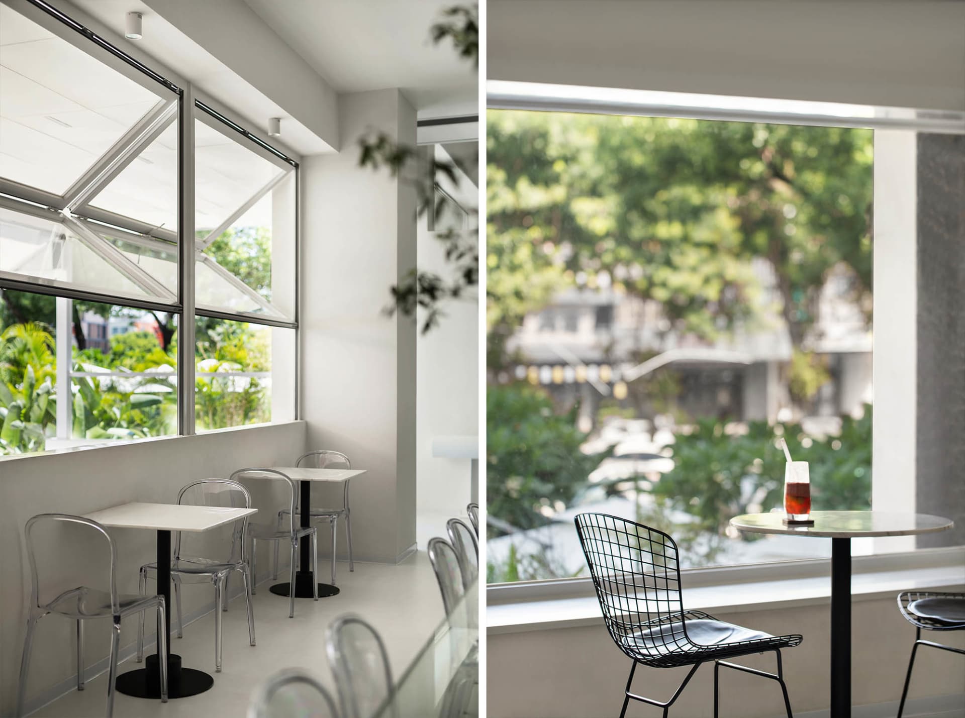 A modern cafe interior featuring glass walls and transparent chairs.