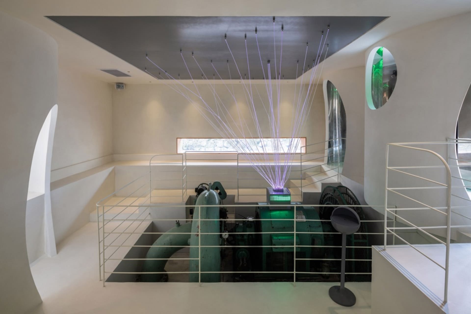 An industrial-style architectural exhibition featuring a concrete interior design.